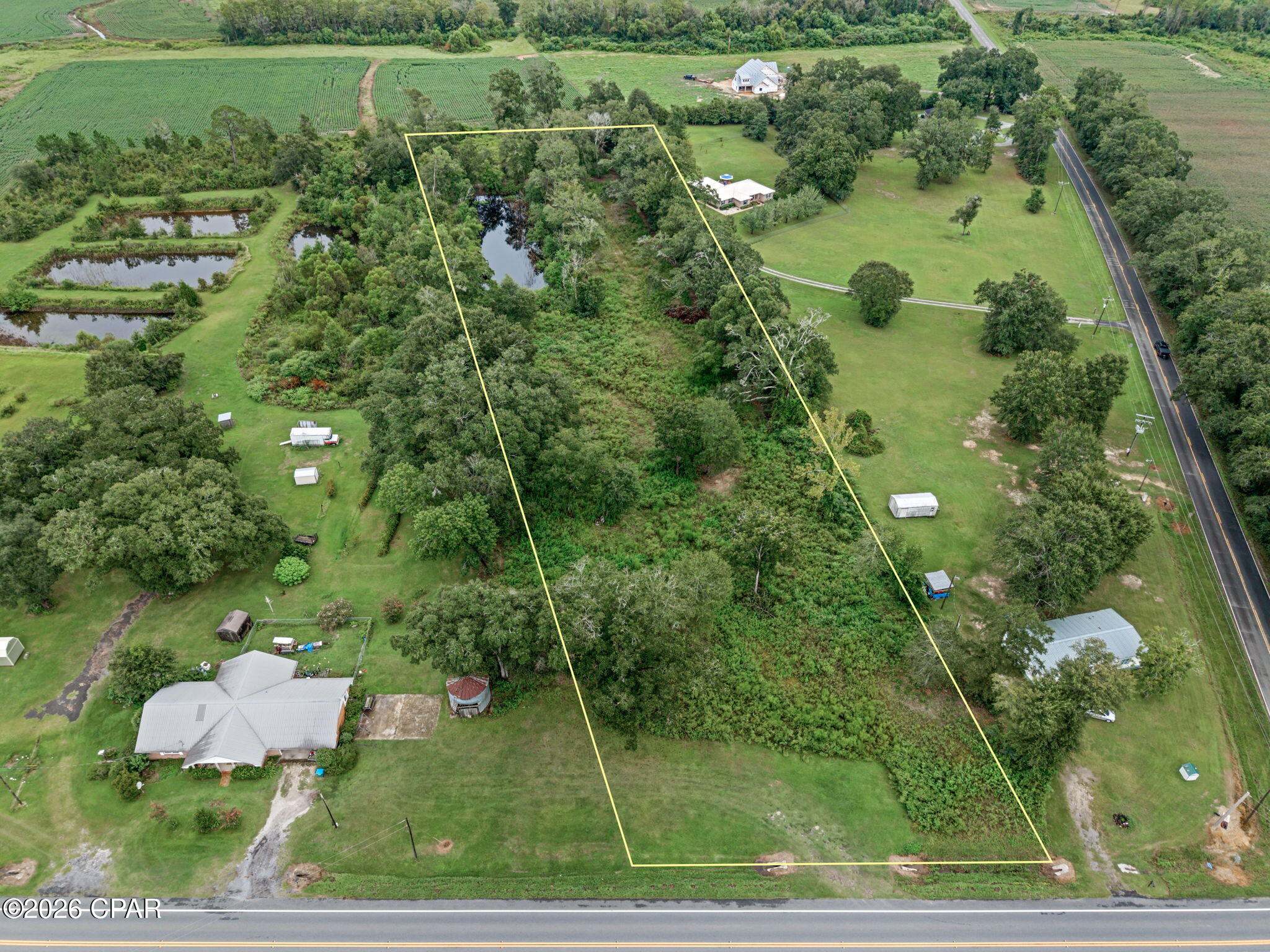 This beautiful 4.75 acres is conveniently located minutes from Dothan, Chipley, and several other towns. There are several spots to pick from that would make a perfect homesite for a new home or mobile home. 
An extra feature is a pond, 2 wells (buyers need to have checked out. They are not working at this time) and paved road access.