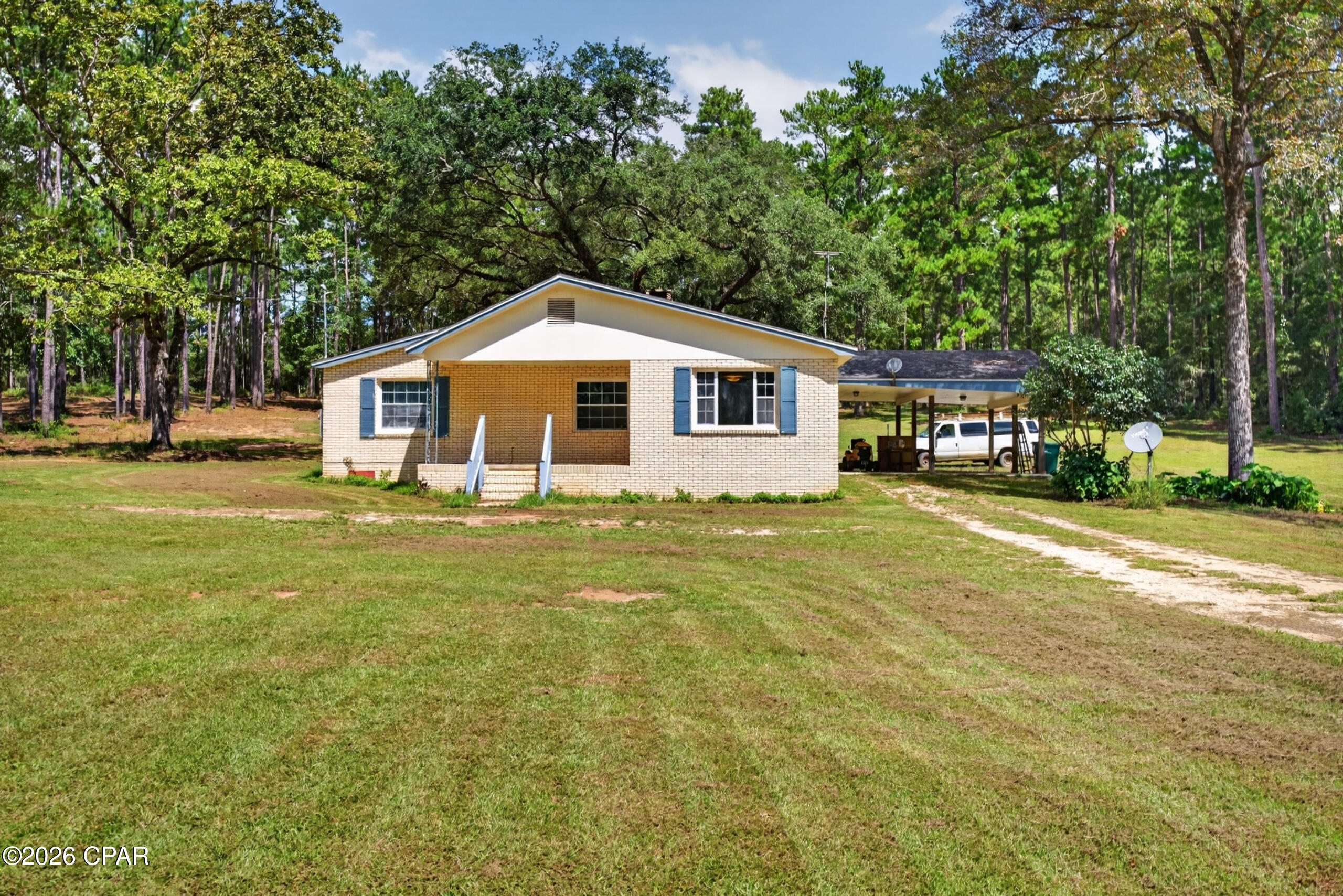 Discover country living on 31.71 acres at 2722 Pioneer Road! This 3-bedroom, 1-bath home has been updated with new luxury vinyl plank flooring, a new HVAC system, and a new electrical panel. The home also features an attached two-car carport for convenient covered parking. Located on the back porch is a utility room with an additional full bathroom; this area is not heated or cooled.

The property is enhanced by approximately 30-year-old pines and offers several potential homesites, creating added flexibility for future use. With more than 31 acres, there is plenty of room to enjoy the outdoors, create a hobby farm, build an additional home subject to applicable approvals, or simply appreciate the privacy and space of a large rural tract. Conveniently located on Pioneer Road with easy access to surrounding communities, this property offers acreage, updates, and versatility in one package.