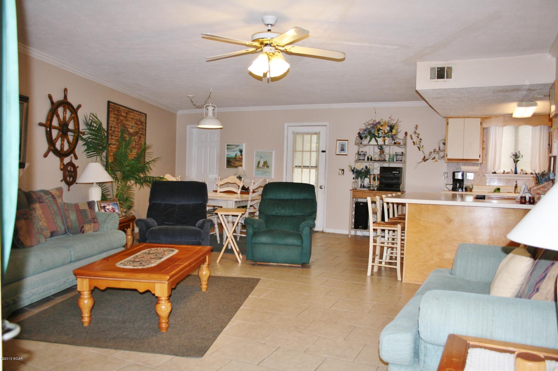 This is a ''One of a Kind'' 2 BR unit in Gulf Highlands Beach Resort. It is located across from the Overflow Parking, Lighted Tennis Courts, Pool, and a very short stroll to the Beach! This would be a great sized unit to Live In or Rent Out. This "Gated Resort" features 11 Pools (5 Heated), 4 Tennis Courts (2 Lighted), An 18 Hole Putt Putt Golf Course, several Shuffleboard Courts, a Conference Center, Fitness Center, Wi-Fi rooms, and a Clubhouse with a Pool directly on the Beach... there is NO EXTRA CHARGE to use any of these amenities. This Resort is great for Walking, Jogging, and Bike Riding. You even own the 2 Parking Spaces in front of your unit along with the Front & Back Yard. NO Elevators to wait on and NO hunting for a Parking Space! This is not a "Condo", so they are much easier to get a loan on. The HOA dues are only $410/Qtr equals ($137/month) the dues include trash, cable, some pest control, termite bond, lawn mowing, sprinklers, and of course ALL the amenities. Gulf Highlands Beach Resort is Great for Weekly Rentals, Snowbirds, or for that Affordable Getaway Home at the Beach!!!  There is a 2 pet maximum per unit with a 25lb weight limit per pet. Age, SF, and Dimensions are approximate... please verify if important.