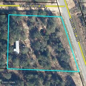 This beautiful piece of property with road frontage on Moss Hill Rd. and Territory Rd. is conveniently located in the southern part of Washington County. Only 30 minutes from Panama City Beach and a short distance to beautiful lakes the possibilities with this acreage are endless . This mobile home would make a great home for first time home buyers, rental property for extra income or a place to live while you build your dream home on this unique piece of property.
