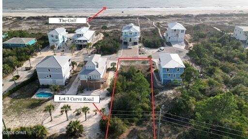 ENDLESS POSSIBILITIES!! Discover your slice of paradise with this exceptional homesite in the gated Curve at the Cape community--a rare opportunity to design & build your dream coastal retreat just minutes from the sugar-white sands & emerald waters of the Forgotten Coast. With beach access right across the street, you'll enjoy effortless days on the shoreline & the sound of the surf just steps from your door. Even better, this homesite offers the opportunity for definite Gulf views from your future home, allowing you to soak in breathtaking sunsets & shimmering water vistas daily. Nestled within one of the most desirable enclaves along the Gulf of Mexico, this pristine parcel offers the ideal blend of natural beauty, small-town charm & long-term investment potential. Picture stepping outside your future front door to the gentle Gulf breeze & the promise of sun-soaked days by the water. Curve at the Cape & the surrounding Port St. Joe area are celebrated for their laid-back coastal lifestyle, welcoming community & breathtaking scenery that stretches to the horizon. Whether you envision a full-time residence, a relaxing second home, or an income-producing getaway, this homesite provides the perfect canvas to bring your vision to life. Rare vacant land in this sought-after pocket of Port St. Joe seldom becomes available, & Lot 3 offers flexibility for thoughtful home design & optimal orientation to capture abundant sunshine & coastal breezes. The gated setting balances privacy with convenience, keeping dining, shopping, boating, fishing & outdoor adventures all within easy reach. From peaceful morning beach walks to unforgettable sunset views over the Gulf, this location captures the very essence of Florida coastal living. With close proximity to Cape San Blas & Port St Joe, endless opportunities for recreation, relaxation & waterfront fun await. Bring your plans, bring your dreams & start living where others vacation. Call for your private tour & LIVE THE BEACH LIFE!!