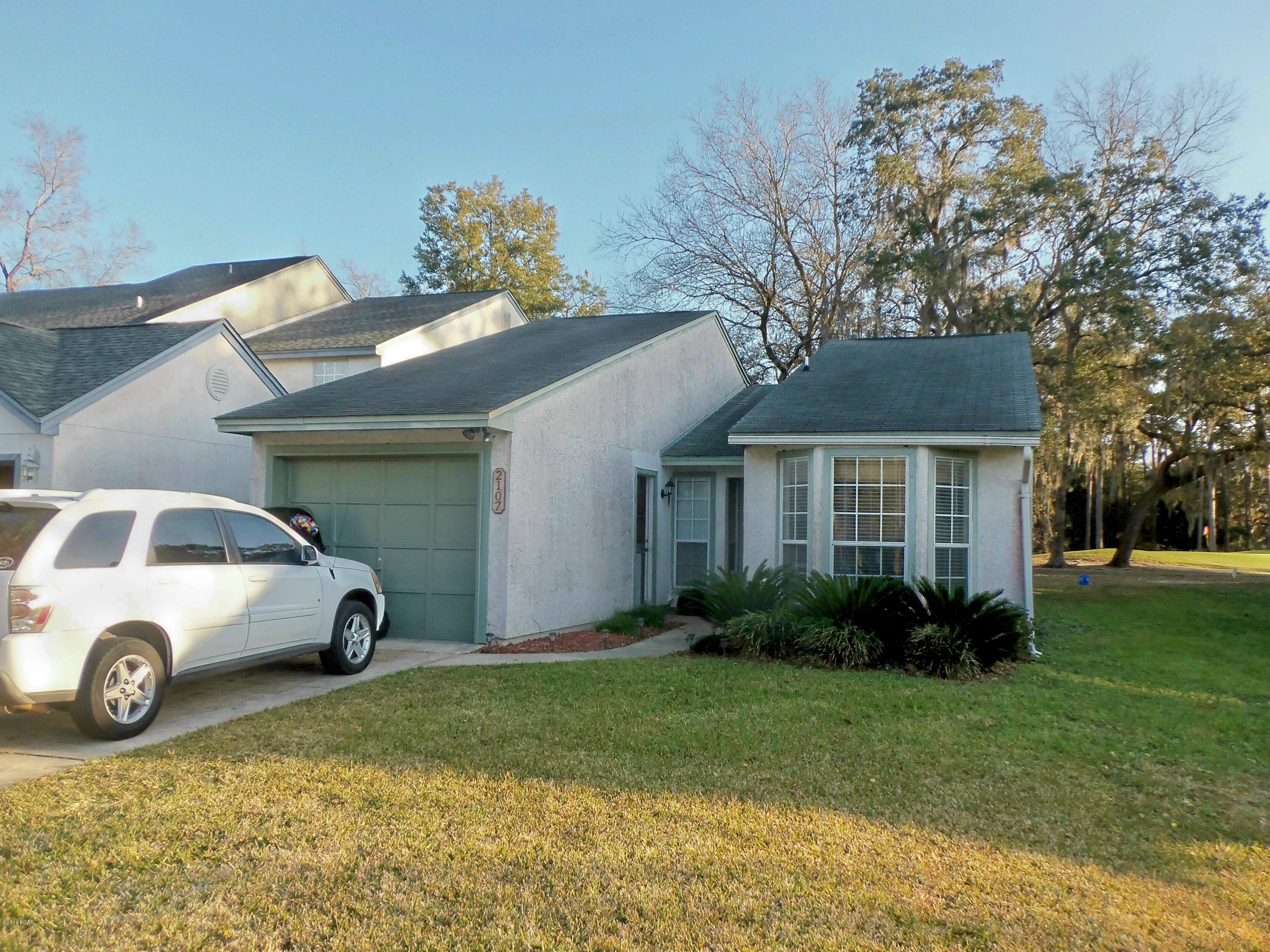 Contemporary two bedroom townhome - rented unfurnished. Tenant pays own utilities. Located on 6th green at Panama Country Club Golf Course. Fireplace - new wood laminate flooring, sinle garage, rear deck with arbor. AVAILABLE NEAR MARCH 1st. Golf and Country Club priveledges (pool dining, etc) by optional membership only - NOT included with rent.