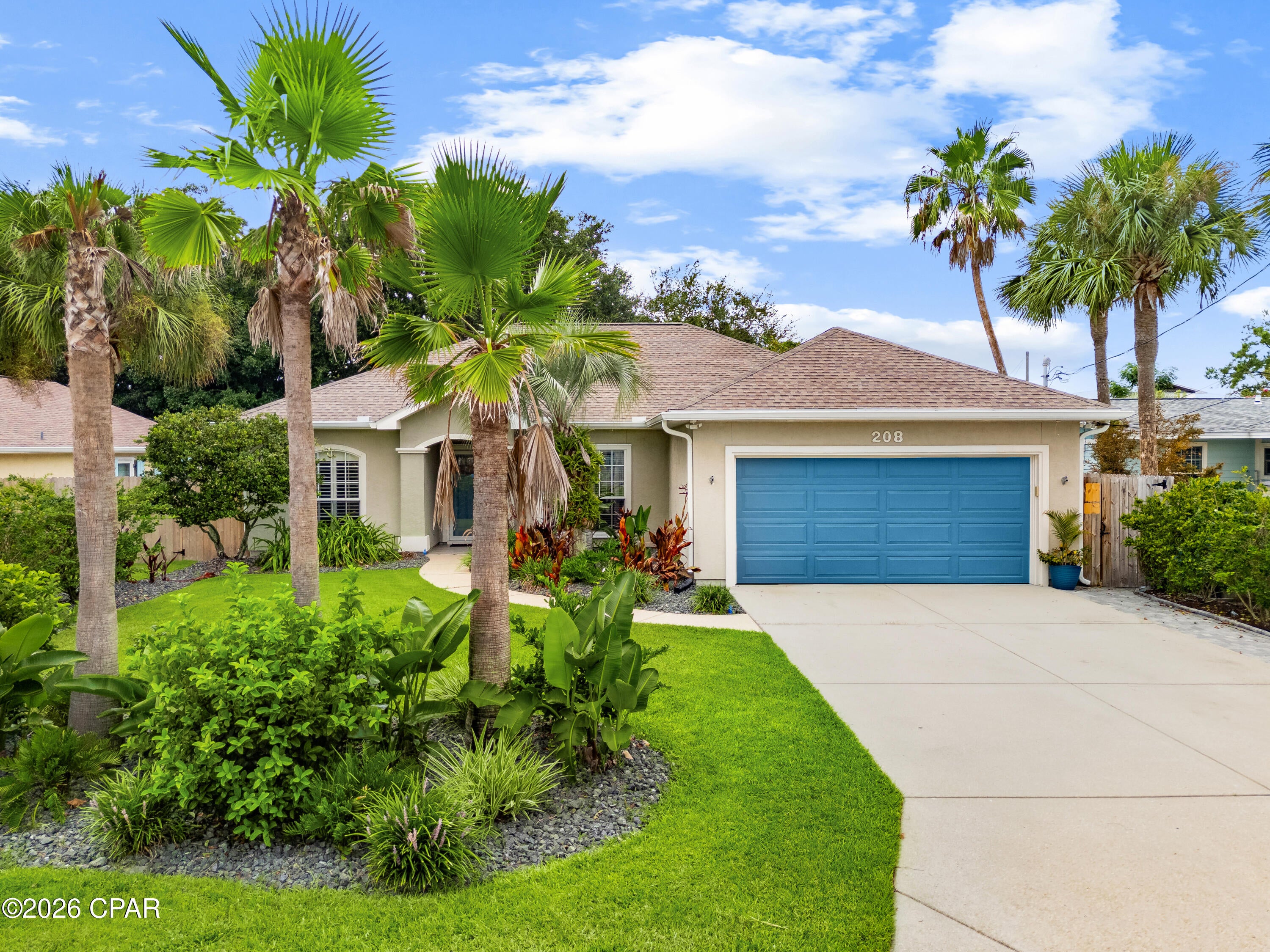 Discover coastal living at its best in this beautifully maintained 3-bedroom, 2-bath home located just a half mile from the beach. From the moment you arrive, you'll be captivated by the lush, professionally landscaped yard that creates exceptional curb appeal and a private tropical retreat.

Inside, you'll find an open and inviting layout featuring durable tile flooring throughout and elegant granite countertops in the kitchen, combining style with easy maintenance. The spacious bedrooms and well-appointed bathrooms provide comfort for family and guests alike.

Whether you're looking for a primary residence,  or vacation home, this home offers the perfect blend of convenience, comfort, and coastal charm. Enjoy morning walks to the beach, relaxing evenings in the beautifully landscaped outdoor space, and all the benefits of living just minutes from shopping, dining, and local attractions.

Don't miss this opportunity to own your slice of paradise just steps from the gulf!