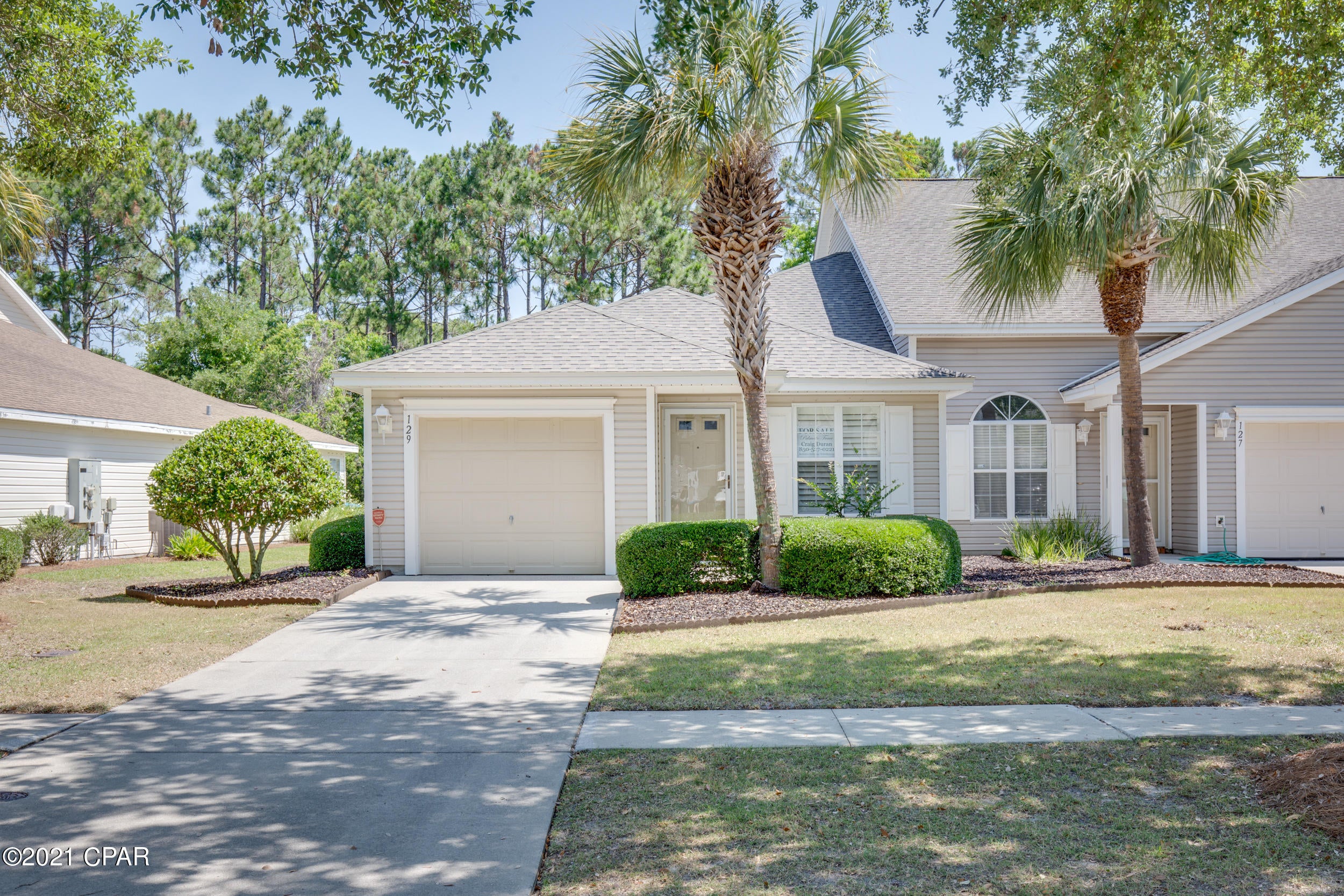 CURRENTLY UNDER CONTRACT, SELLER ACCEPTING BACKUP OFFERS'. 2BR/2BA END UNITS like this don't come up for sale often. This beautiful townhome in Palmetto Trace was just painted, includes plantation shutters and backs up to nature area so no neighbors behind. Unlike many of these, THIS one has a screened in patio, has a new roof (2019) and new HVAC (2018). BOTH bathrooms are upgraded REBATH bathrooms and even the washer, dryer and digital thermostat convey. Pier Park, Frank Brown Park and the beach are all just a golf cart ride away in this ''golf cart approved'' community that includes two pools. Make an appointment to see this one today.