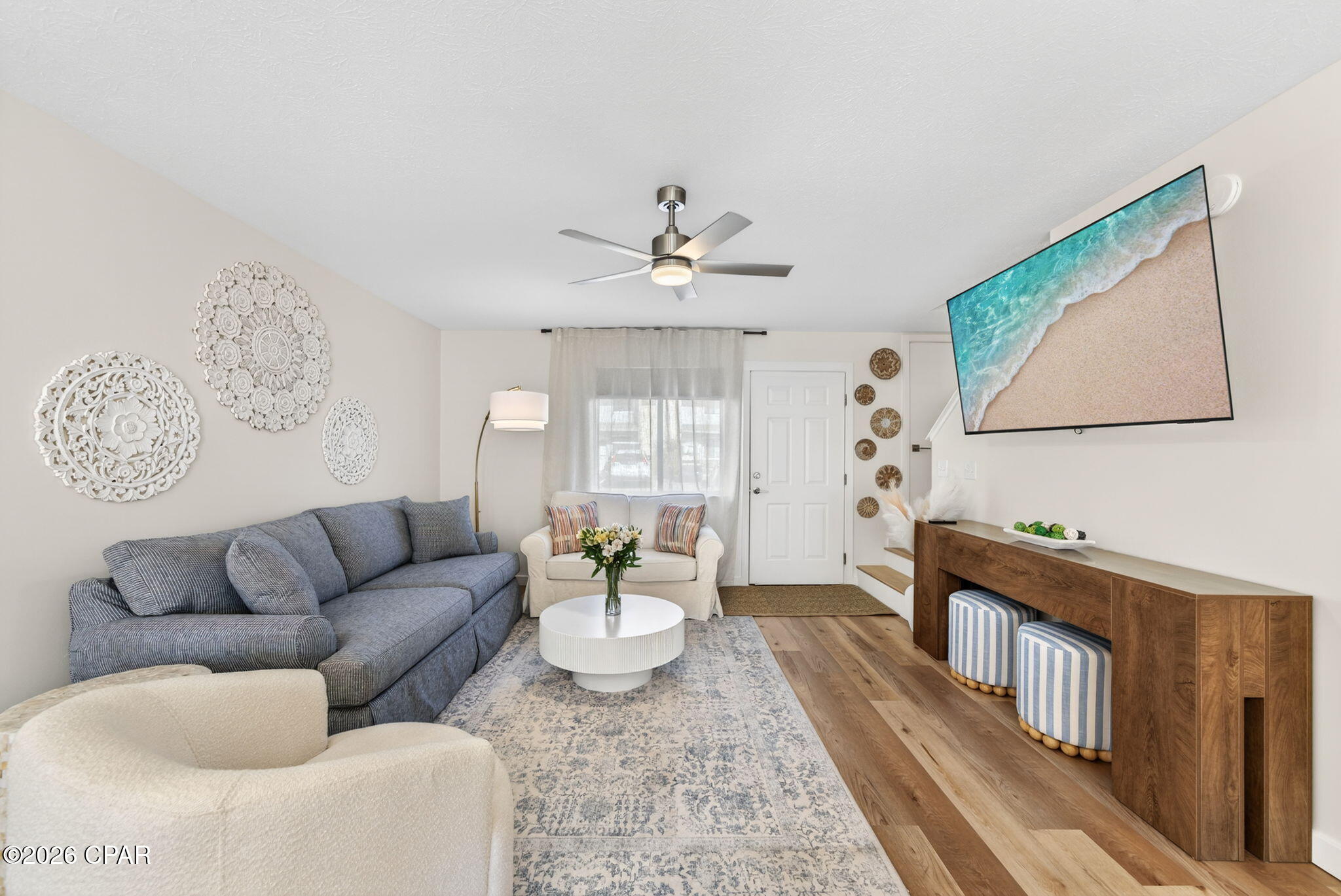 CURRENTLY UNDER CONTRACT, SELLER WILL CONSIDER BACKUP OFFERS.
Totally renovated, tastefully decorated and fully furnished 2Bd/ 2.5Ba, 1,008 SqFt townhome located in Gulf Highlands Beach Resort. Updates include new shaker-style, soft-close kitchen cabinets with White Lace quartz countertops, a large island/breakfast bar, and a brand-new Whirlpool stainless steel appliance package. Additional upgrades include a newer roof (2019), tankless gas water heater, newer HVAC, fresh interior and exterior paint, luxury vinyl flooring throughout, hardwood stairs, brand new furniture. The home also features new trim, shiplap accents, an updated lighting package, and fully renovated bathrooms. Laundry area includes washer and dryer.

The unit is conveniently located next to the heated pool and offers an oversized patio, along with two assigned parking spaces directly in front. The property is located in Flood Zone X, so flood insurance is not required. Low HOA fees with both long- and short-term rentals allowed. Ideal as a primary residence, vacation home, or income-producing investment.

Gulf Highlands Beach Resort is centrally located in the heart of Panama City Beach, directly across the street from the beach. The community offers a private, gated beach access with a crosswalk and traffic light across Front Beach Road. This manned, guard-gated resort features a Gulf-front clubhouse with pool and snack bar, plus 10 additional pools (five heated), four tennis courts, pickleball and shuffleboard courts, an 18-hole mini golf course, two playgrounds, a fitness center, and a conference center--all included in the HOA. The resort is golf-cart friendly and within walking distance to restaurants, shopping, and entertainment, with plenty of streets for walking or biking.

Great financing options available, including FHA and VA. Call today for your private showing!