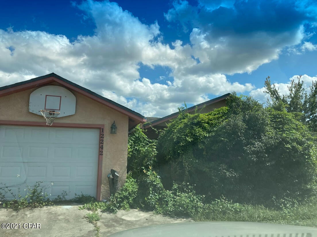 3/2, 1,724 sqft. house on the pond. Damaged from a hurricane and not repaired.

In need of a roof, drywall and paint inside, some mildew/mold present.

Lots of trash and some furniture to be removed. Seller left all kitchen appliances, plus W/D.

Said that all were in working order, as well as A/C. Power is OFF.

NOTE: Speed is of the essence with the new buyers, before the Bay City. Ordnance wants it demolished.

The property has a single-car garage with the owner's contents to be removed prior to close.



SHOWING BY APPOINTMENT ONLY. CALL FOR APPOINTMENT. PLEASE REFER TO THE AGENT COMMENTS TO REQUEST A SHOWING.