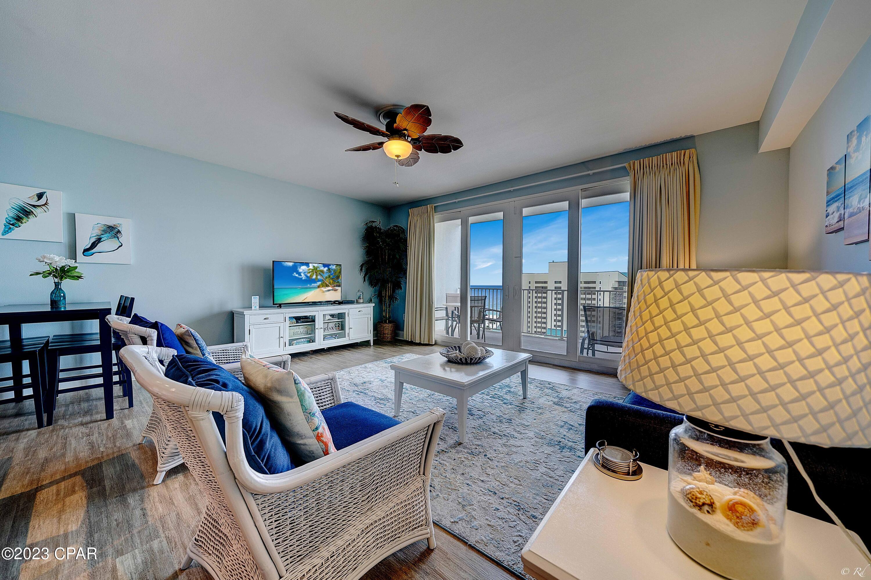 'CURRENTLY UNDER CONTRACT, SELLER WILL CONSIDER BACKUP OFFERS | GULF VIEWS! Beautifully updated 1 bedroom, 2 bathroom unit with a bunk hall at the highly desired Laketown Wharf complex! This unit comes fully furnished and is ready for rentals. This unit boasts a beautiful view of the Gulf from the living room, kitchen, and balcony. The kitchen features stainless appliances, granite counters, and a kitchen island with a breakfast bar. The primary bedroom boasts a private primary ensuite bathroom. The primary bathroom features a shower/tub combo and granite counters. The bunk hall has been updated with a barn door and leads to the guest bathroom for the ultimate convenience. The living room and bedroom feature LVP flooring. The stackable washer/dryer will convey. The hot water heater was recently replaced. Laketown Wharf boasts beach access, FIVE pools including rooftop pools, a splash bar and grill, a golf course, pickleball, nightly fountain and light shows, a fitness center, covered parking, restaurants, an ice cream shop, market shops, and more! Laketown Wharf also hosts plenty of events year round and has endless activities for the family. This condo is located near many local restaurants including Gulf front eateries as well as plenty of family-friendly activities such as charter boats, go-karts, mini golf, Ripley's Believe It or Not, WonderWorks and more! Check out this condo today for your next investment property or primary residence!