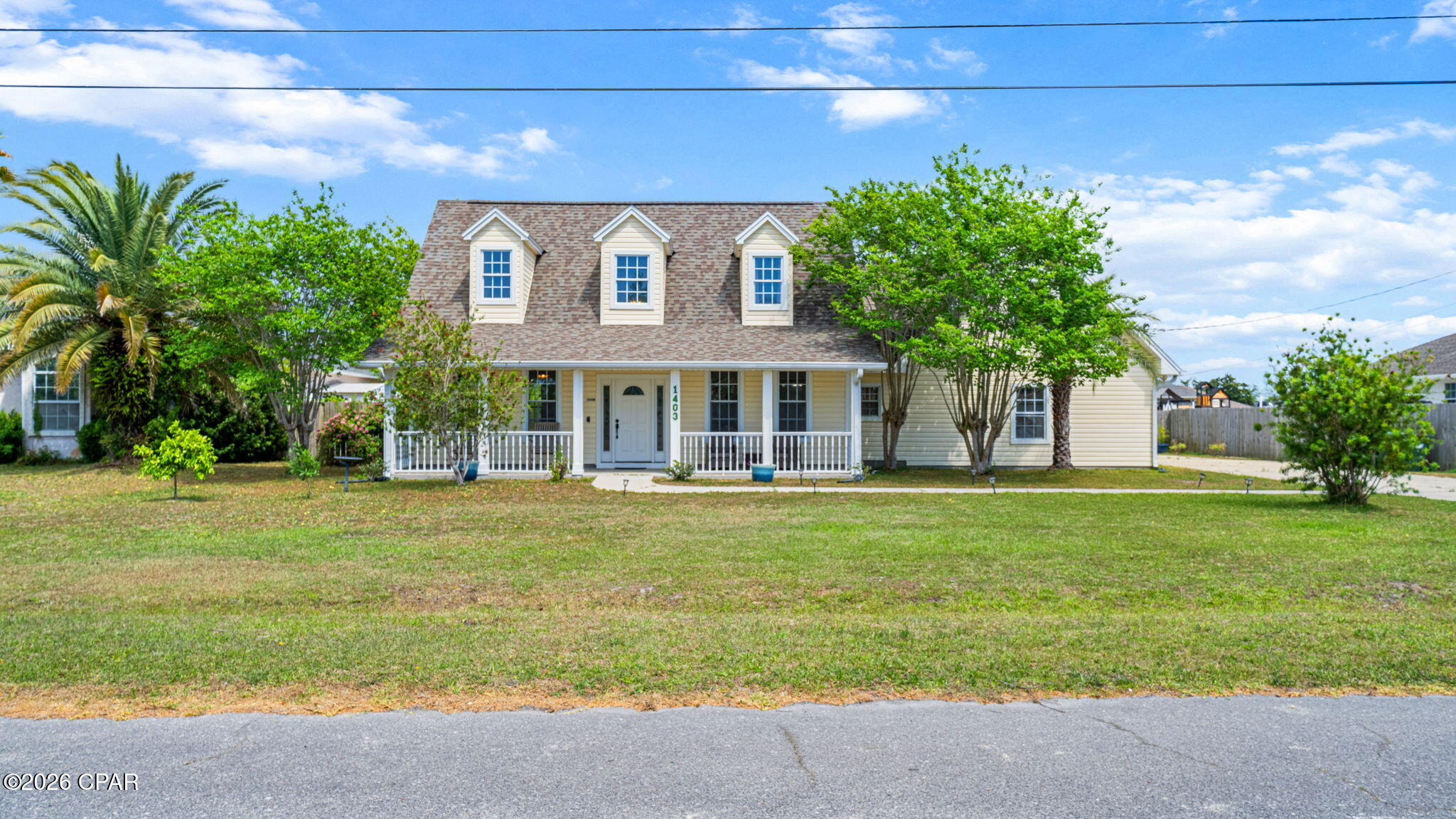 Located in a top-rated school district and tucked away on a quiet cul-de-sac in the heart of Lynn Haven, this spacious five-bedroom, two-and-a-half-bath home is designed for connection, comfort, and effortless living.

Soaring ceilings and an open, airy layout create an inviting first impression, while the first-floor primary suite offers both privacy and convenience. The main living area flows seamlessly into the kitchen and dining space--perfect for everyday living and entertaining alike.

Thoughtful upgrades and improvements throughout provide both value and peace of mind. The home features a Culligan reverse osmosis water filtration system with softener (2024), a brand-new water heater (2026), and a whole-home surge protector. The kitchen is equipped with a newer refrigerator and stove (2022), along with a microwave (2024), while updated lighting--including an overhead kitchen fixture (2015)--adds warmth and functionality.

Additional enhancements include a replaced HVAC system (2019), updated front and rear doors (2018), a new garage door opener, and a garage motion security light (2024). An oversized two-and-a-half-car garage and expansive driveway ensure ample room for parking and storage. For outdoor enjoyment, a 2023 grill conveys with the sale, perfect for hosting and relaxing at home.

Upstairs, four additional bedrooms and a full bath offer incredible flexibility--ideal for guests, a home office, or growing households.

Situated in a golf-cart-friendly neighborhood with NO HOA, this home is just minutes from a local sports complex, bay access, nature preserves, and everyday conveniences. With new commercial development and Publix nearby, convenience meets lifestyle in one of Florida's most desirable communities.

Lynn Haven continues to stand out as one of the Top 10 Best Places to Live in Florida, offering a perfect blend of community charm, coastal proximity, and lasting value.