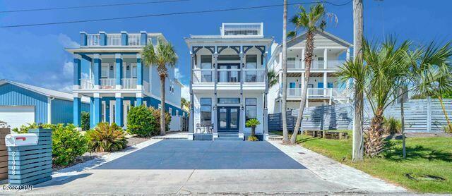 SO CLOSE TO THE GULF! This beautifully furnished 3 story home comfortably sleeps 14 and is only 1 block to Beach Access #88 and the open waters of the Gulf. It is thoughtfully laid out with the living room, kitchen, laundry, and master bedroom on the ground floor. The 2 bedrooms on the second floor can sleep 10, and shares a large, 2 entrance bathroom. The 3rd floor sleeps 2 more, has a wet bar with mini-fridge, and has an 11x11 open deck with incredible views. You have multiple sliver views of the Gulf and a wide-open view of the night sky for some star gazing, or fireworks on the 4th of July and New Years. The private inground swimming pool has an attached spa, and the large pool deck covers the entire back yard, so there is NO YARD MAINTENANCE to worry about.  Sitting on the quiet west end of PCB, this home will allow Short Term Rentals and is perfect for that family getaway. Pier Park, Top Golf, and Dolly's Pirate Dinner Theatre are less than 6 miles away.  Sellers will consider some owner financing with a large enough down payment, so ask for details. Meas. are approx.