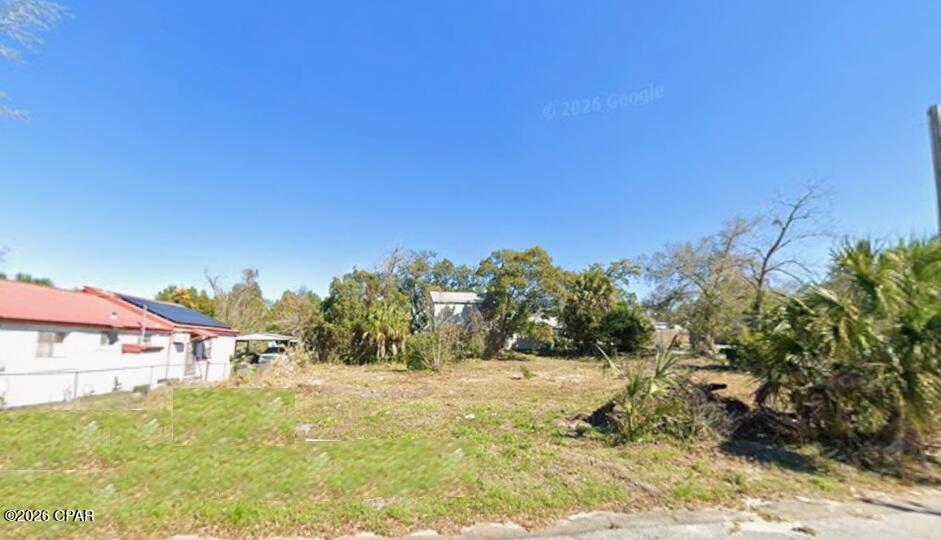 Large vacant parcel ready for new home construction, located within Opportunity Zone and Neighborhood Residential zoning district.  Convenient location close to the hospital, downtown Panama City, restaurants and shopping.  Up and coming neighborhood in redevelopment stages with many newly constructed homes nearby.  Build a single family home (with optional ADU) or duplex, with a nice backyard buffered by mature trees.