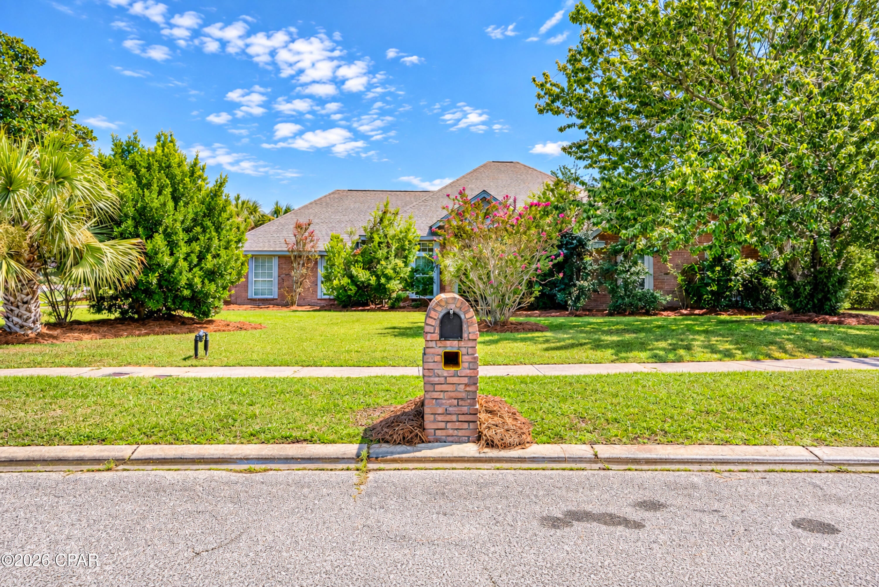 Beautiful home located in desirable The Wood subdivision. This 4/2.5 home is perfect for a growing family.  Features include tankless hot water heater, newer roof, new windows, new pool pump, new pool equipment, granite countertops, laundry room, pantry. Inground pool in fenced backyard. Seperat detached garage that could be used and a mancave or recroom.  Minutes from 23rd St shopping and medical offices. Call for your showing today!!