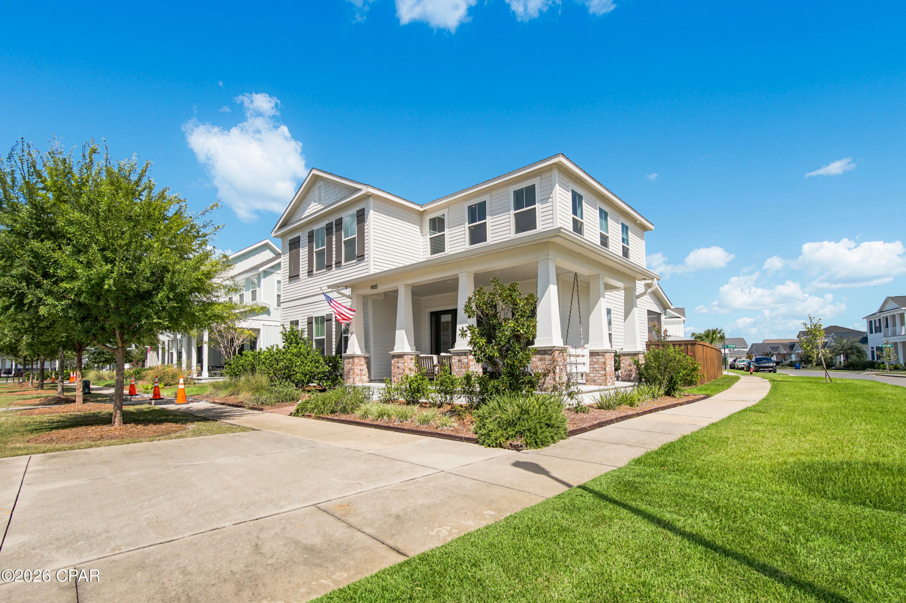 Welcome to this beautiful home in SweetBay, one of Panama City's most sought-after communities. Situated on one of the neighborhood's largest corner lots, this property offers exceptional outdoor space and peaceful lake views.

Inside the St. George floor plan, you'll find 10-foot ceilings throughout, a beautiful expansive chef-inspired kitchen, spacious bedrooms, and a versatile formal dining room that could easily convert to serve as a fifth bedroom, home office, or private mother-in-law suite. Upstairs, a spacious loft provides the perfect space for a movie theater, playroom, or kids' hangout. Permanent smart lighting installed along the soffits allows you to customize the exterior for holidays, game days, and special occasions throughout the year.

SweetBay offers an incredible lifestyle with North Bay access for kayaking, canoeing, and paddleboarding, along with swimming pools, pocket parks, basketball and tennis courts, walking and jogging trails, an amphitheater, playgrounds, and a welcoming, pet-friendly atmosphere.