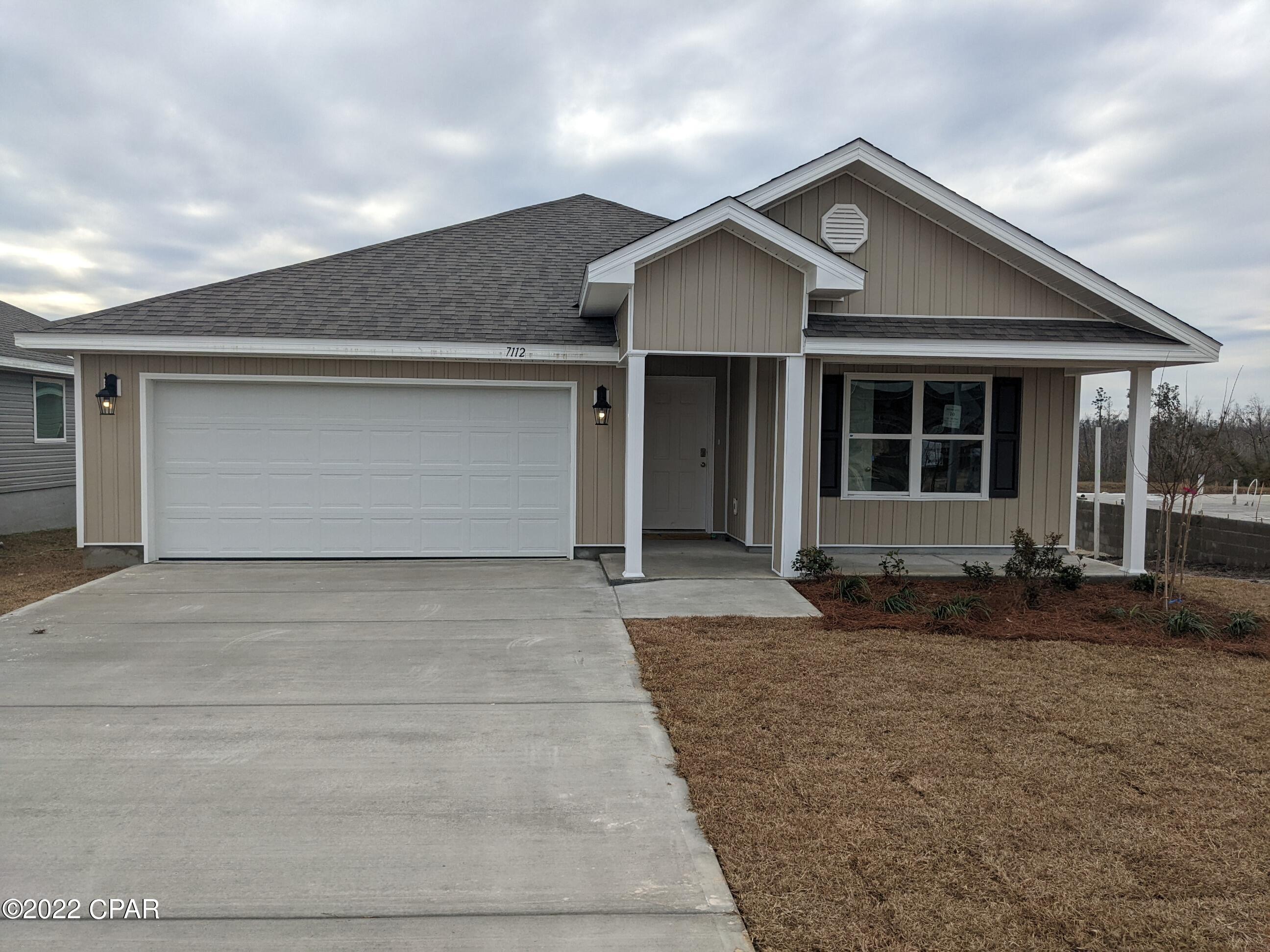 Welcome to Olde Towne Village! If you enjoy days of fun in the sun, Deer Point public boat launch is just 15 minutes away. Launch your boat into Deer Point Lake or travel further into the North Bay or even the Gulf of Mexico! This beautiful Cali plan features 4 bedrooms with 1 that can be used as a den or office. Interior features include quality paint with orange peel textured walls and traditional 8' ceilings. Vinyl flooring is throughout the home with plush carpet in all bedrooms. The kitchen is open with a center island, a pantry, beautiful light cabinetry, and durable laminate countertops. Bedroom 1 has a spacious bath with a separate shower, large soak tub and walk-in closet. Model Home is located at 7196 Hatteras Blvd. Open

Mon - Sat 10:00 AM - 6:00 PM and Sun 1:00 PM - 6:00 PM. This home comes standard with a Smart Home Technology package which includes a KwikSet keyless entry, Skybell doorbell, automated front porch lighting, an Echo Dot device, and Quolsys touch panel which can be integrated to control your lighting, thermostat, front door and so much more. 

This home is being constructed with the Zip Sheathing system, providing greater protection than a traditional housewrap from damages due to wind, rain, and extreme weather. A builder 10-year structural warranty is also included.

Pictures may be of similar, but not necessarily of subject property, including exterior and interior colors.