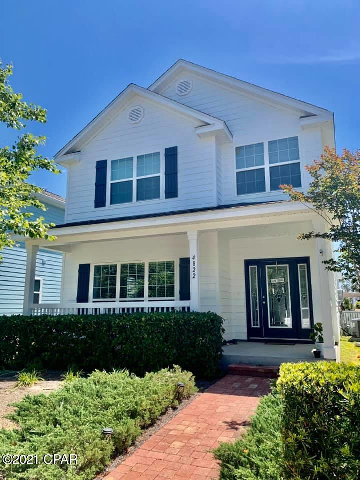 This Beautiful Home in the Magnolia Bay Club is close to the Panama City Navy Base, Grade A schools, Bay Point, beaches and restaurants! This Craftsman Style home has two living rooms which is perfect for big families. The spacious kitchen features granite counter tops, stainless steel appliances, with a gas stove and a breakfast bar! This home has a tank less water heater. The huge master bedroom upstairs features two barn doors with a walk in closet. The beautiful master bath has a double vanity, a walk in tiled shower and a huge soaking tub. The home also has a detached 2 car garage. This home has everything and more. Magnolia Bay Club amenities include a community pool, gym, play grounds, bay beach access, A huge fishing dock. Sizes are approximate. Verify if necessary.