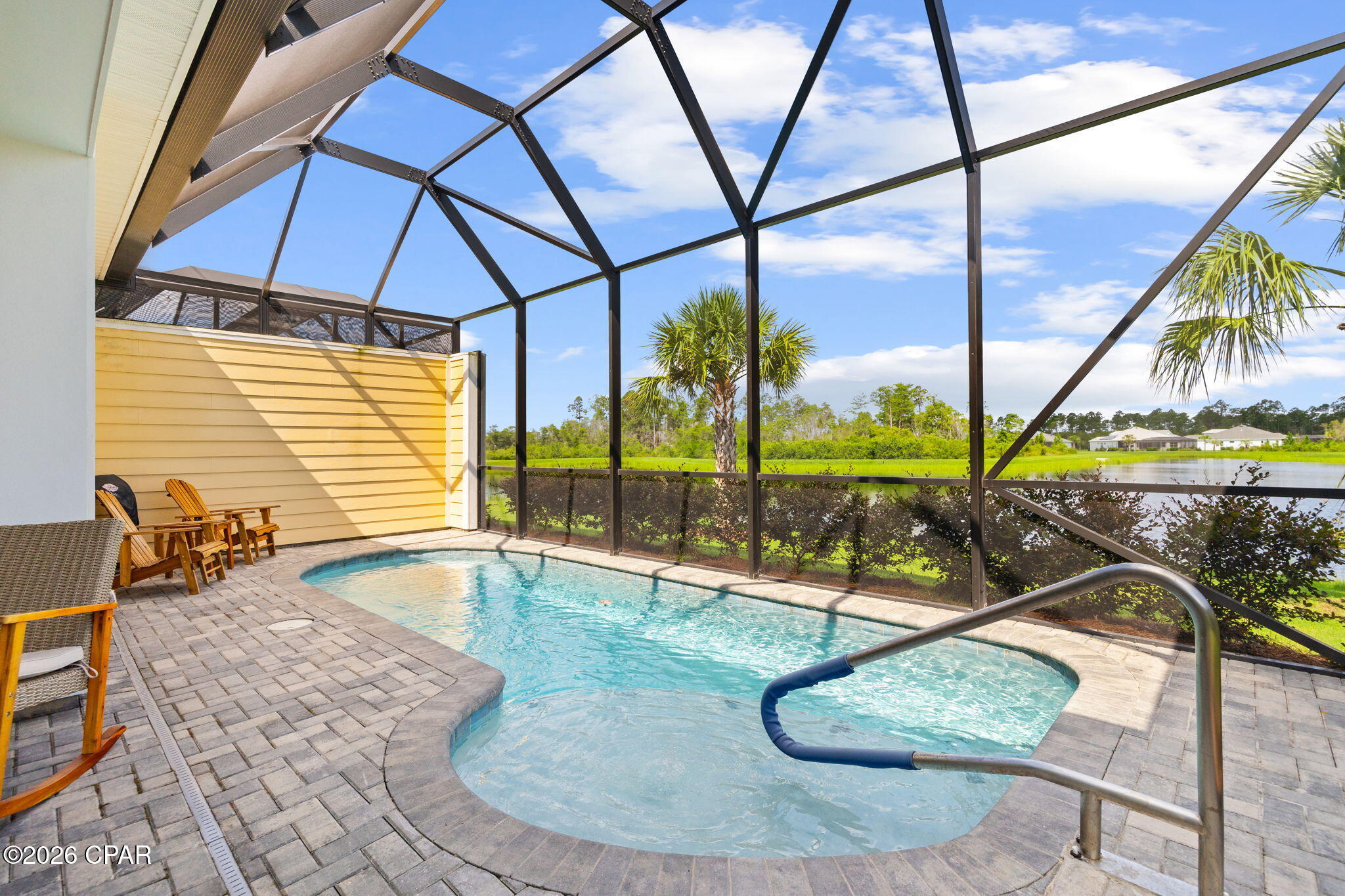 'CURRENTLY UNDER CONTRACT, SELLER WILL CONSIDER BACKUP OFFERS' ~~ ''Jamaica'' Villa Home in Phase 2, VERY CLOSE to the AMENITIES, the INTRACOASTAL WATERWAY, and only 7 miles to the Beautiful WHITE SANDY BEACH on the GULF! ~ Do you want to make your FRIENDS JEALOUS... Change your Latitude to... Latitude M'ville WaterSound 55+ Community with AMENITIES that AMAZE the ''ACTIVE'' Owners. This Community has an AMAZING ZERO ENTRY PARADISE POOL but if you want your PRIVACY, no worries, this Jamaica Villa even has its own PRIVATE HEATED POOL on the Screened in Lanai, right out your back door. This 2 Bedroom also has an added ''Bonus Room'' a DEN with Glass Doors so you can quietly work but not miss anything happening in the home. The KITCHEN has Gas & Electric hook-ups, Double Oven Range, Double Trash Pull Out, Cabinets with Pull Out Shelves, Pots & Pans Drawer, Quartz Countertop, 42'' Cabinets, and a Water Purifier at the Kitchen Sink. The MAIN BEDROOM - is very Spacious with a Private Bathroom that features a Tiled Walk-in Shower and Quartz Countertops. The Walk-in Closet has ample room for everything you need. The Living Area has Sliding Doors that open up to the Lanai and offers a BEAUTIFUL VIEW to your own POOL and the LAKE out back. The Guest Bedroom is at the other end of the home, so everyone has their own space and Bathroom. The 2 Car Garage also has a UTILITY SINK and a Beautiful Epoxy Floor. All the Appliances will remain, to include the Washer & Dryer. You don't have to worry about the Lawn, Landscaping, Exterior Paint, or the Roof Replacement; the HOA is responsible for those items, when they determine they are needed. There is also a 10 year ''Structural Warranty'' from the Builder, that started from the original build date. *** You will love all the Unbelievable AMENITIES including the 2 Story BAR & CHILL Restaurant with 3 Bars, Large Oasis Pool, 10 Pickleball Courts, Tennis Courts, Outdoor Pool Table, Ping Pong Table, Putting Green, Bocce ball, Cornhole, Fins Up Fitness Center, Indoor Lap Pool & Indoor Whirlpool, Last Mango Theater, The Hanger Wood Workshop, Pottery, Barkaritaville Pet Spa, Walking Trails, and Live Music by the Pool, the Restaurant, and at the Bandshell. You are only 5 miles from the NEW HOSPITAL & DR OFFICES. There will also be a PUBLIX right at the ENTRANCE to YOUR NEW HOME COMMUNITY. Bring your Fancy Golf Cart and join the Fun Filled Community!!!