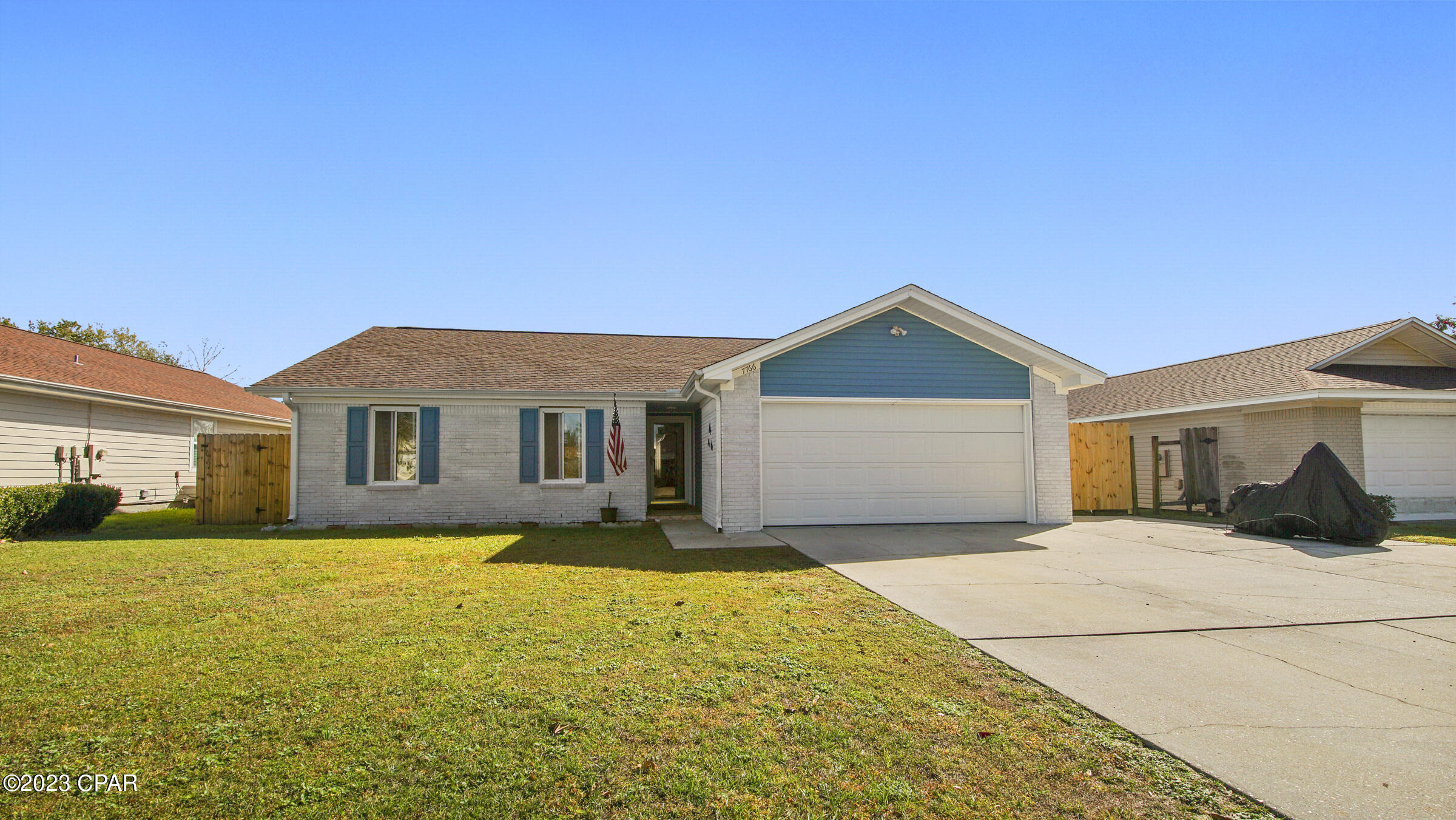 Beautiful 3 bedroom/2 bath home conveniently located near Tyndall AFB, restaurants and more! This home boasts beautiful curb appeal, an oversized driveway, whitewash brick, vinyl, gutters & a storm door. Inside you will find the perfect layout for entertaining with an open living room featuring a wood burning fireplace, & vaulted/beamed ceiling, flowing into the dining room/kitchen which offers granite, built in pantry, tile flooring & stainless appliances. The master bedroom has tile flooring, en suite & a wrap around closet. There is a large bonus room off the kitchen overlooking the backyard. The backyard features a shed/workshop and a stone fire-pit. Schedule your showing today!