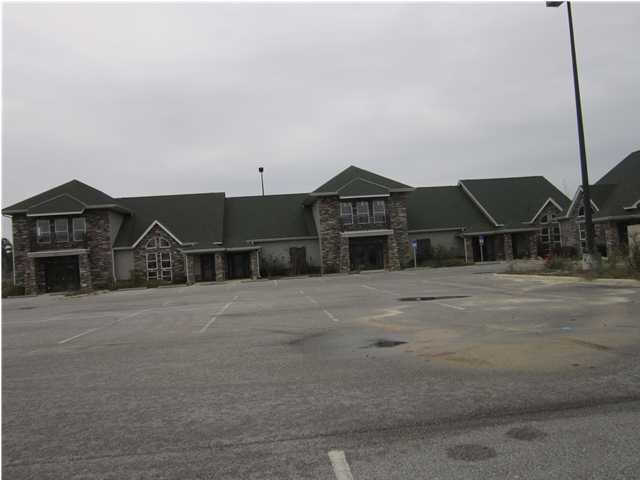 REDUCED -- REDUCED --FORECLOSED - COMMERCIAL OFFICE/ RETAIL BUSINESS CENTER IN THE MIDDLE OF LYNN HAVEN. THERE ARE 2 BUILDINGS, 1 HAS APPROX. 14353 S.F. AND THE OTHER HAS APPROX. 15145 S.F. THERE IS A TOTAL OF 6 UNITS IN EACH BUILDING. ONE BUILDING HAS 4 UNITS RENTED, 2 UNITS TO EACH RENTAL SPACE. THE OTHER BUILDING HAS 1 UNIT BUILT OUT, BUT IS NOT RENTED, AND NEEDS 2 HVAC UNITS. ALL OF THE REMAINING SPACES IN BOTH UNITS HAVE NOT BEEN BUILT OUT, UPSTAIRS OR DOWNSTAIRS. THE BUILDING HAS BEEN LANDSCAPED AND IS IN GOOD SHAPE. THE ADDITION ACERAGE HAS A RETENTION POND AND STILL HAS ROOM TO BUILD ADDITIONAL BUILDINGS. THERE IS AMPLE PARKING FOR THE BUILDINGS. THIS BUILDING IS BEHIND THE LYNN HAVEN POST OFFICE AND AT THE END OF THE NEW SUPER WAL-MART. ACCESS TO THE PROPERTY IS FROM HWY 77,