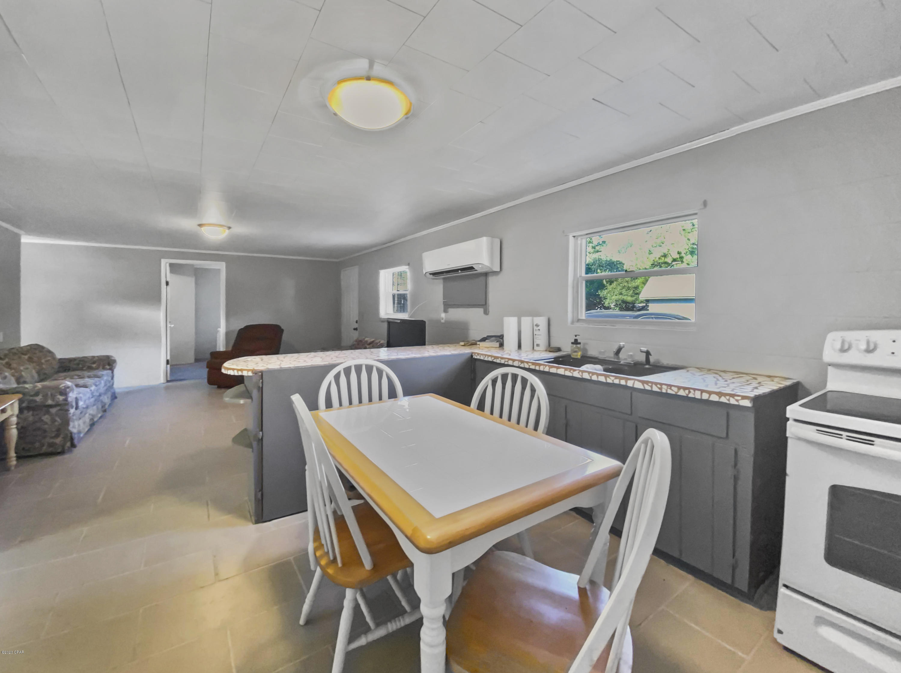 This 4 bedroom, 2 full bath solid block beach cottage is move in ready! Partially furnished, owner is willing to consider pets. Walk, bike, or ride to the beach in this golf cart friendly community. Just mintues to the Lake Powell park and boat ramp, grocery stores, and local restaurants! A five minute drive to Inlet/Rosemary Beach 30A area and Camp Helen State Park. Only 10 minutes from all Pier Park has to offer. Great neighborhood full of friendly home owners.