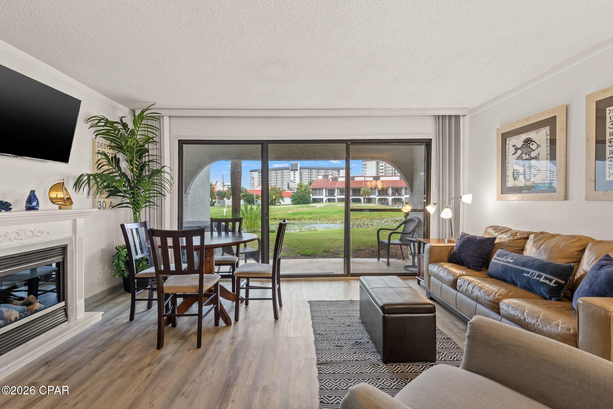 Discover the exceptional opportunity to own Villa #112 at Edgewater Beach & Golf Resort, one of Panama City Beach's most sought-after gated resort communities. This extremely rare studio floor plan offers the full Edgewater resort experience while featuring the lowest HOA dues in the entire complex.

This fully furnished, ground-level villa offers a unique combination of comfort, convenience, and privacy, with beautiful golf course views from both the living area and private back patio. Ground-level living means easy access with parking immediately outside the front door--no stairs, elevators, or long walks when unloading luggage, groceries, or beach gear. The villa is also conveniently located directly beside one of Edgewater's many heated villa pools.

Owners and guests enjoy an impressive array of resort amenities, including the spectacular 11,000-square-foot lagoon-style pool, 10 additional heated pools, hot tubs, on-site restaurants and bars, a nine-hole golf course, tennis and pickleball courts, and more. Getting to the beach is simple, with a short walk across the Edgewater Walkover Bridge or complimentary tram service providing easy access to the lagoon pool and beachfront.

Beyond the resort gates, an outstanding selection of restaurants, shopping, entertainment, a convenience store, bowling, and other attractions are just moments away. The Bay County Pier is also approximately two blocks from the resort.

With 24-hour security, convenient villa-front parking, full access to Edgewater's world-class amenities, and a rare studio configuration with exceptionally low HOA dues, Villa #112 presents a truly special opportunity to own a piece of the Edgewater lifestyle.