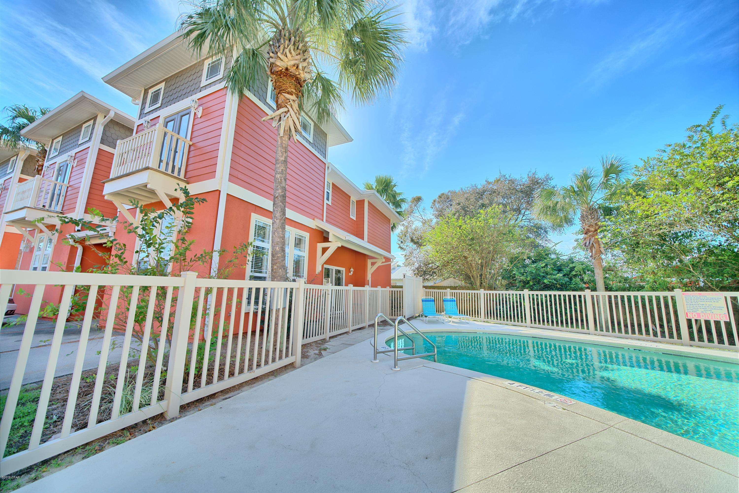 ''CURRENTLY UNDER CONTRACT, SELLER ACCEPTING BACKUP OFFERS'' On this 3 bed 2 1/2 bath townhome. GREAT end unit with a side patio overlooking the community pool and has been beautifully renovated to meet the upscale taste of the owner. Renovations include new vinyl plank flooring, new carpet, NEW HVAC in 2017, fresh interior paint,  NEW stainless steel range & microwave, exterior paint and the list goes on & on. Coral Bay Village is a small 16 home community with brick paver streets, a community pool. WONDERFUL opportunity to use as your VACATION HOME and LEASE FOR 6 MONTHS during off periods (NO SHORT TERM RENTALS).  This FANTASTIC west end location is not only close to the beach but is just 10 minutes from Rosemary Beach, Scenic 30A and Pier Park's shopping, dining & entertainment. ALL DIMENSIONS & SQUARE FOOTAGE ARE ESTIMATED. PLEASE VERIFY IF IMPORTANT.