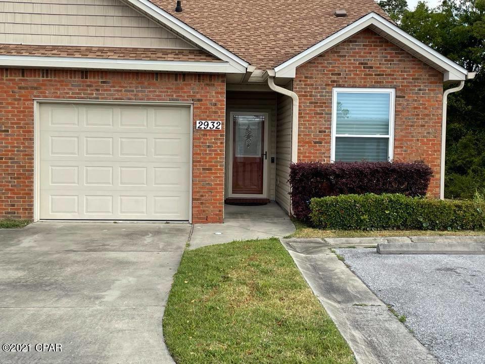 Beautiful 3 bedroom 2.5 bath townhome.  UNFURNISHED. Tucked away in a quiet neighborhood off 77.  This is a must see.  Wood look porcelain tile throughout the first floor.  A beautiful kitchen, open to living room.  This house features a first floor master with glamourous master bath. Double vanity, soaking tub, separate shower, walk in closet and private water closet.  2 bedrooms and a bath upstairs, as well as a bonus room.  Attention to detail shows in the unique lighting and ceiling fans selected.  Backyard features a covered patio, lawn, sprinkler system.  Lawncare included. No pets please.