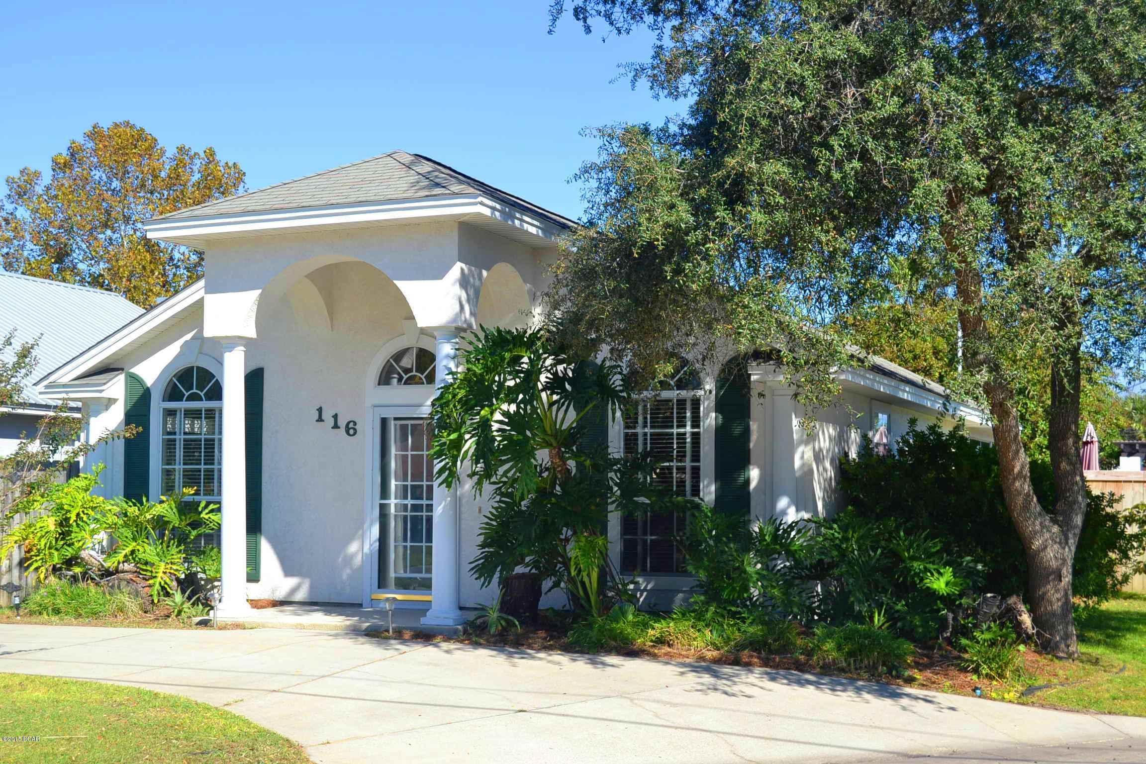 FANTASTIC BEACH HOUSE just steps to the beach!!!!. This 2 bedroom 2 bath beach home is located on a great corner lot with a circular driveway. The home has an open floor plan, vaulted ceilings, eat-in kitchen, new HVAC, hot water heater, screened-in back porch, fenced backyard and nice landscaping.  Open Sands which is a fantastic beach neighborhood, steps to the beach, very close to Pier Park and is golf cart friendly!. Don't miss this opportunity to own your perfect beach home!. ALL DIMENSIONS AND SQUARE FOOTAGE ARE APPROXIMATED PLEASE VERIFY IF IMPORTANT!.
