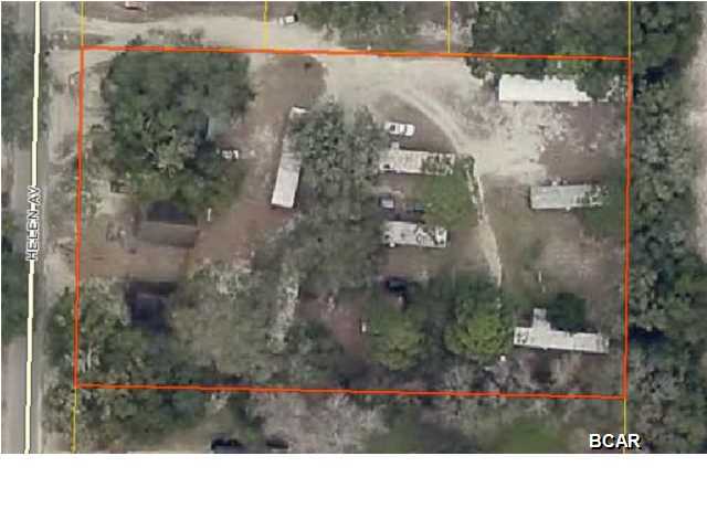 3 HOUSES + 7 MOBILE HOMES + 1.5 ACRES. House Number 744: 3 Bedrooms/1 Bath, House Number 740: 2 Bedrooms/1 Bath, House Number 738: 1 Bedroom/1 Bath. All mobile homes are single wide. The 8th single wide on property is not included. Great rental income. Located within walking distance to schools. Call today for more information.