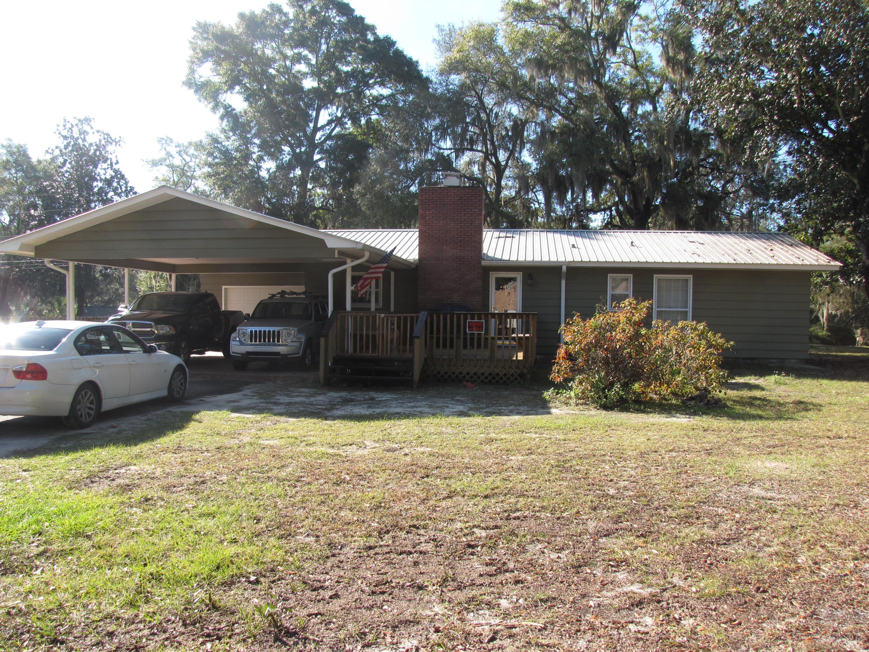 3 bedroom 2 bathroom home with 1 car garage and carport.  Fenced yard with large patio. Home also features a fireplace, updated appliances, fixtures cabinets and counter tops.