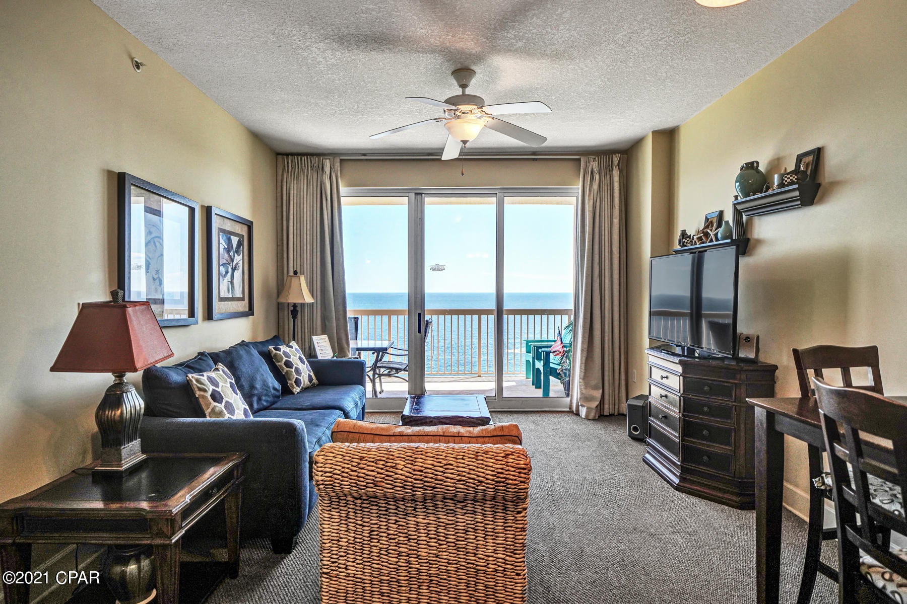 This floorplan features a Gulf Front Master Bedroom and a Large Bunk Room (rents like a 2 bedroom), and 2 Full Baths. Open floorplan allows for fabulous Gulf and sunset views from balcony, living room, dining room, kitchen, & master suite providing the ultimate alfresco living and entertaining environment!. Tastefully decorated and will convey fully furnished and rental ready. EXCELLENT RENTAL INCOME POTENTIAL (sleeps 6).  Enjoy the good life at Sunrise Beach! Sunrise has two pools and two hot tubs. One of the outdoor pools is heated in the winter, so you can swim year round. FOUR HIGH-SPEED ELEVATORS serve 221 condos which is one of the best ratio of elevator/condo on the beach. Also, PARKING IS UNDER THE BUILDING, no long walk-over every time you park. Centrally located to all the dining and entertainment PCB is famous for including spas, shopping, golf, fishing and more! Sunrise Beach has amazing amenities, including: 346 feet on the Gulf of Mexico, Gulf front exercise room, covered parking in garage under the building (you don't have walk across the street), 2 Gulf front swimming pools, 2 Gulf front spas, children's water play area, BBQ area with gas grills and more!