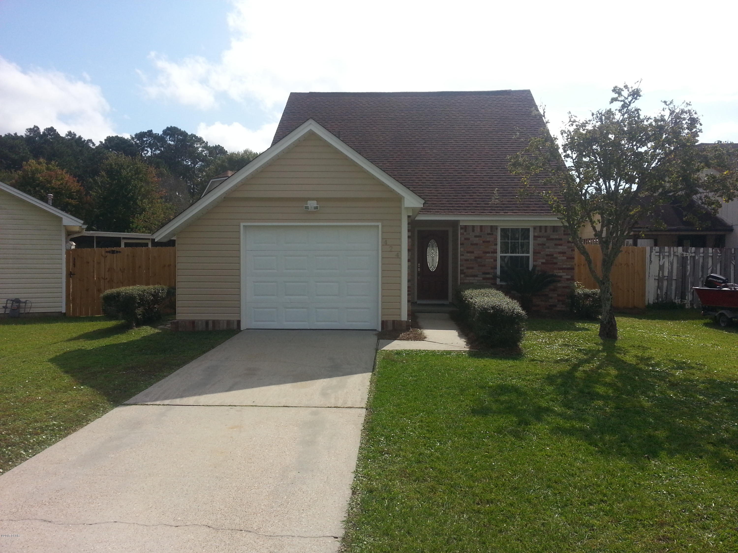 Welcome home to 424 Tanya Pass. This home has been COMPLETELY renovated from the top down. New Roof, siding, windows, doors, and an exterior fence. New HVAC and a 50 gallon water heater. The kitchen features bright white shaker cabinets with 42'' uppers, soft close doors and full extension drawers with dovetail joints,  under cabinet lighting on dimmers, a white subway tile back splash, beautiful granite counter tops with new stainless steel Whirlpool appliances including fridge. The main floors are covered in a  porcelain tile plank laid to resemble a hard wood floor. The main floor master features plush carpet, 4 closets a double vanity and a custom floor to ceiling tiled shower. At the top of the hand crafted  oak  staircase reveals a comfortable open loft with a view of the main living area, two additional bedrooms, and a tastefully decorated full bath with a sky light.  During the renovation the Sellers realized just how family oriented, and friendly this community truly is. Sellers are seasoned renovators and once again have completed this home as if THEY were going to move their family in.  If your clients watch HGTV, this may check all of their boxes.