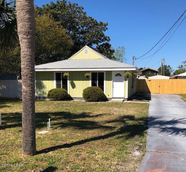 Adorable Florida cottage.  Close to Pier Park-dining, shopping, concerts  Half mile to the gulf.  This house has a brand new roof.  This is an all electric home. Open kitchen with a breakfast bar, lots of cabinets too! Has a lovely Florida room. Lots of shade in the privacy fenced yard. Attached outside storage room and separate utility building. Comes with a washer and dryer.