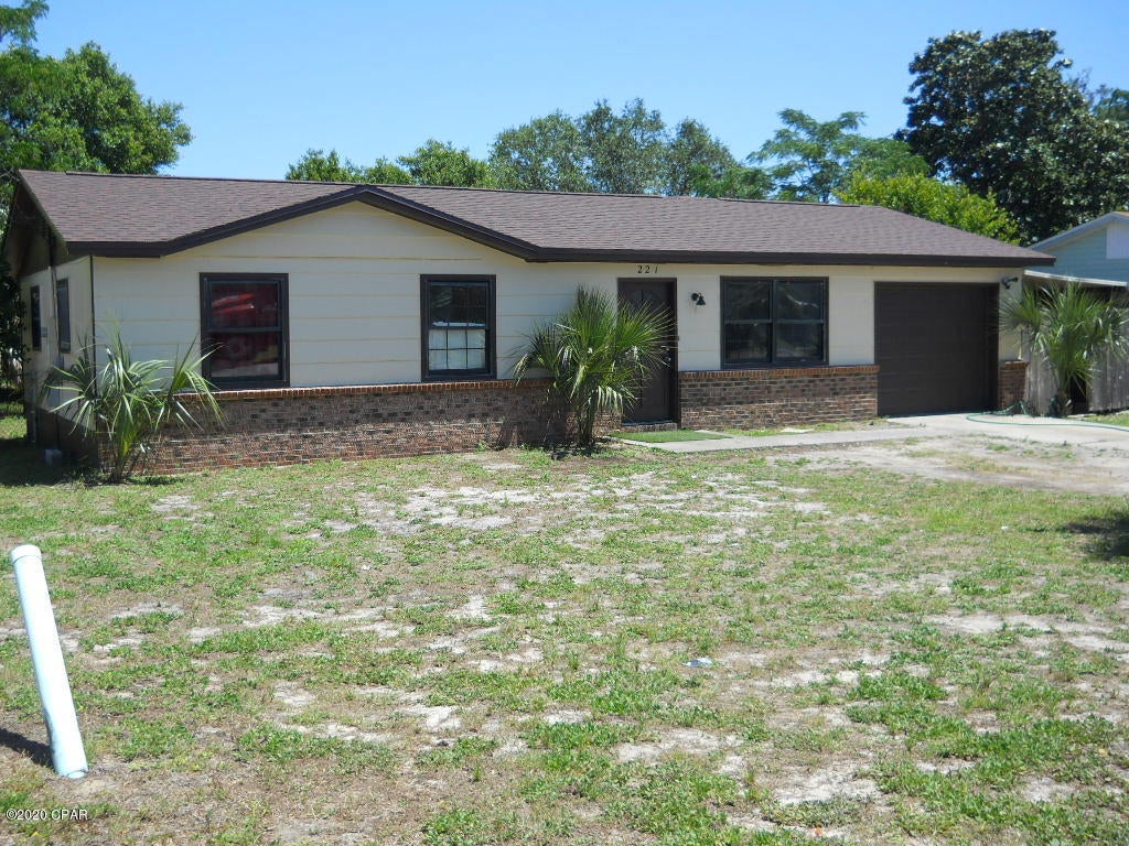 Great Location in the Heart of Panama City Beach and just a few blocks to the Beautiful Gulf of Mexico. Home sits on a larger lot and features 3 bedrooms 1.5 baths, larger family room with fireplace and plenty of room for pool table and entertaining, covered porch off the family room, 1 car attached garage and yard building. Home is within walking distance of restaurants, shopping and Pier Park.
