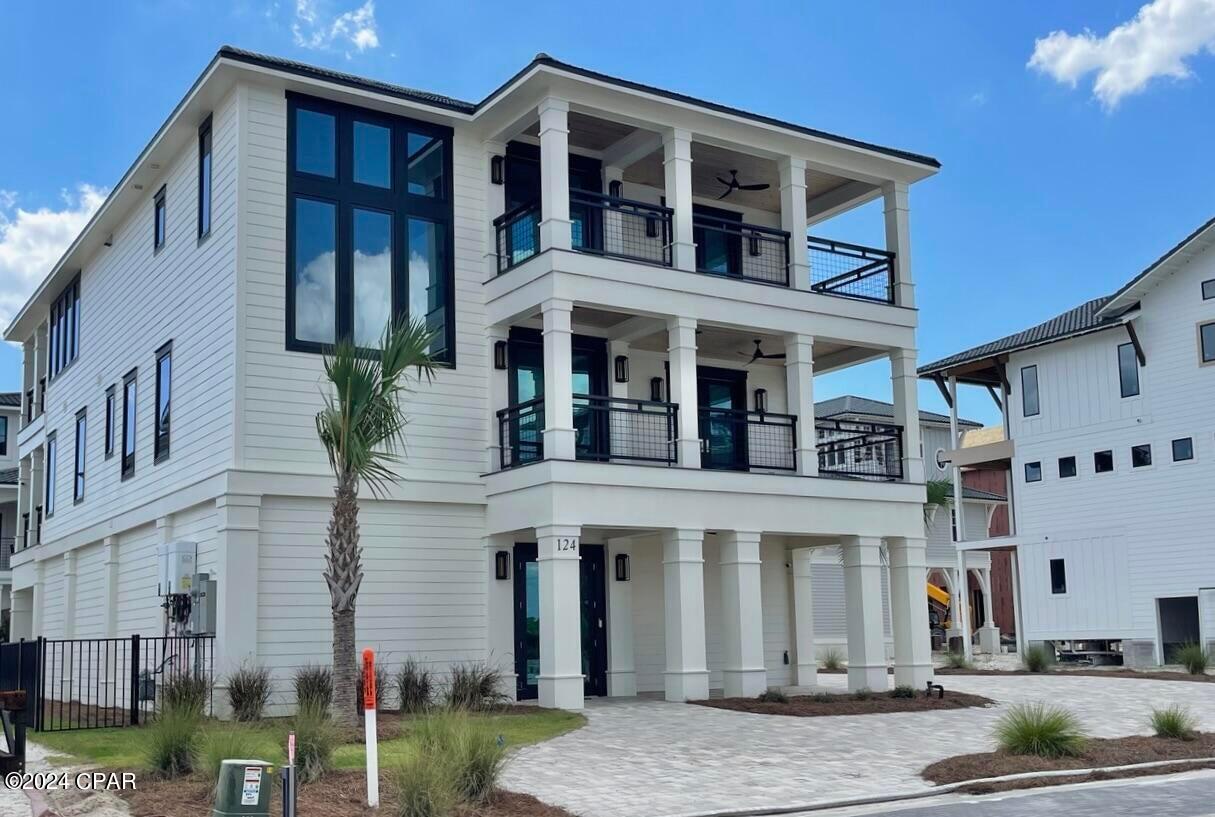 A fabulous Sugar Sand Beach home in one of a kind Gated Coastal Community of only 64 homesites in Mexico Beach. This Coastal Community unique with its surroundings of protected Nature preserves. The Beach is endless with privacy. The Community Pool & Pool House are well designed for picturesque entertaining offering expansive indoor & outdoor space, Gourmet Kitchen & nicely equipped Gym. A home w/ attractive curb appeal offering nice landscape with expansive parking in the beautiful finished Garage & the large driveway. Take the Elevator: 2nd floor Living areas with 9' ceilings, Master Suite comfortably designed w/ luxurious Bathroom & Custom walk-in Closet, 4 Bedrooms, 3 Bathrooms & Luxury Laundry room; 3rd floor Grand Living Room, elegant Kitchen & High end Gourmet Thermidor appliances and super Grand Island, an adjacent overflow Kitchen area with additional built in Storage, Crushed ice maker & Espresso/Coffee maker. Choose your view from one of 4 sizable Balconies all with composite Decking & Cypress ceilings - Back balconies offer some Gulf Views over acres of untouched Dunes - front Balconies offer views across the Preserved areas that surround the breathtaking Community. Must see to appreciate!