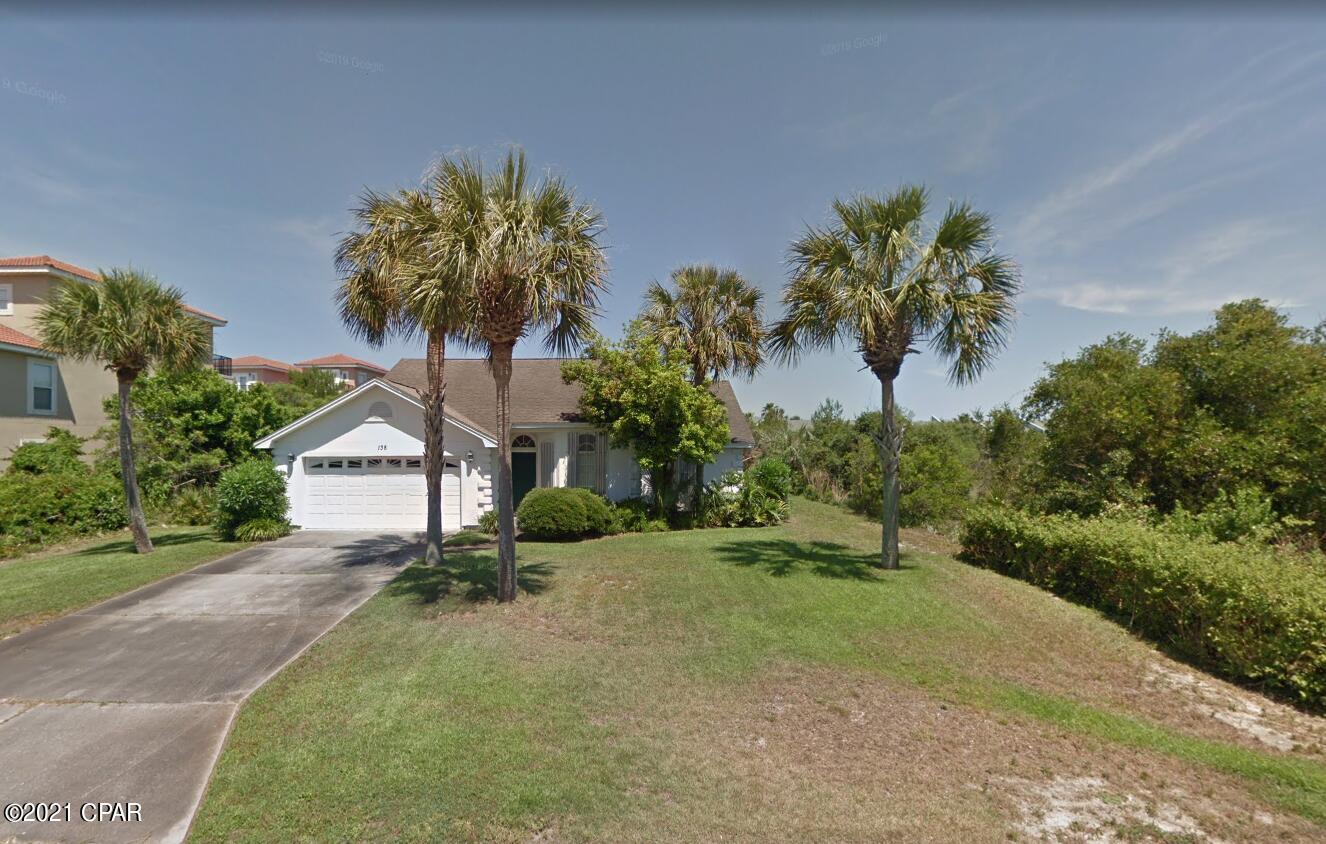 HUGE LOT!!!! Perfect Beach Bungalow. Just a block from the beach, with public beach access. Located near Sunnyside, the house is built in the middle of a double lot. The land is a little over half an acre. The house was built and owned by the same owner since 1996. 3 Bedroom, 2 bath with plenty of room in the back to add a pool and still have privacy! 2 car garage. Mature landscaping and tall palm trees. The house needs a little cosmetic TLC, but is turn key should new owner decide! Short term rentals are allowed and there is NO HOA!! Perfect spot for a family beach retreat or a income producing short term/long term rental home. New roof in 2019.  All measurements are approx. If important please confirm.