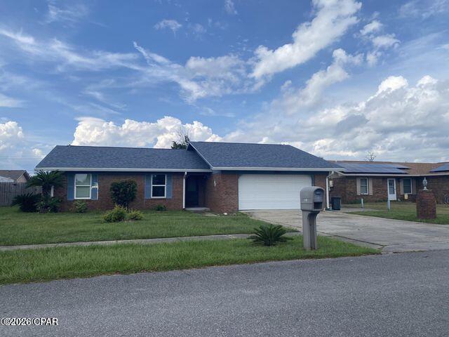 MOTIVATED SELLER Nice quiet area, JUST Minutes to Tyndall AFB and Public boat ramp that takes you out to the Gulf. This brick 3 bedroom 2 bath with a nice size back yard is ready for you... It has a large covered deck, HUGE workshop Beautiful corner fireplace...Just ready for you to make it your own. Back yard is fenced for your Dog already.. Best thing is NO HOA to bother you...Put your boat or camper in your driveway no one will knock on your door....Great fishing just up the strret.. especially if you love to catch Mullet. I use to bring my kids there by the bridge to let them play in the water and see the stingrays and dolphins
