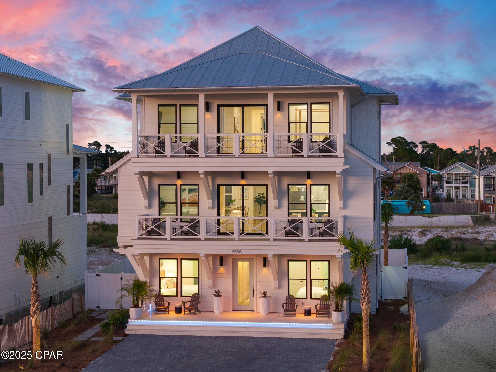 Set within the exclusive coastal enclave of Hadley's Beach, a thoughtfully planned community of just 20 residences, 5936 Gulf Drive offers a refined approach to modern beach living along the shores of Panama City Beach. With direct beach access just steps away, days unfold easily between the home and the turquoise waters and white sand shoreline that define this stretch of the Gulf.

Completed in 2025, the residence spans 4,747 square feet and is offered fully furnished, blending contemporary design with effortless livability. Gulf views are woven throughout the home, creating a constant connection to the water and surrounding coastal landscape.

The home features six bedrooms and six-and-a-half bathrooms, including a dedicated bunk room designed with both flexibility and comfort in mind. The second floor serves as the primary gathering space, where a spacious living area, expansive kitchen, and dining area come together in an open, light-filled setting. Premium kitchen appliances, generous counter space, and thoughtful design details support both everyday living and elevated entertaining.

On the third floor, the primary suite offers a private retreat with a balcony overlooking the Gulf, accompanied by a sitting area, wet bar, and private laundry, creating a self-contained space designed for both relaxation and convenience.

Outdoor living is centered around a private pool, offering a peaceful alternative to the beach just beyond. A first-floor laundry room adds ease after time spent at the pool or shoreline, supporting the natural rhythm of coastal living.

Located within a community that allows short-term rentals, the property offers flexibility alongside its design-forward appeal. With its combination of Gulf views, curated interiors, and immediate access to the beach, 5936 Gulf Drive presents a residence where thoughtful architecture and the coastal lifestyle come together in seamless balance.