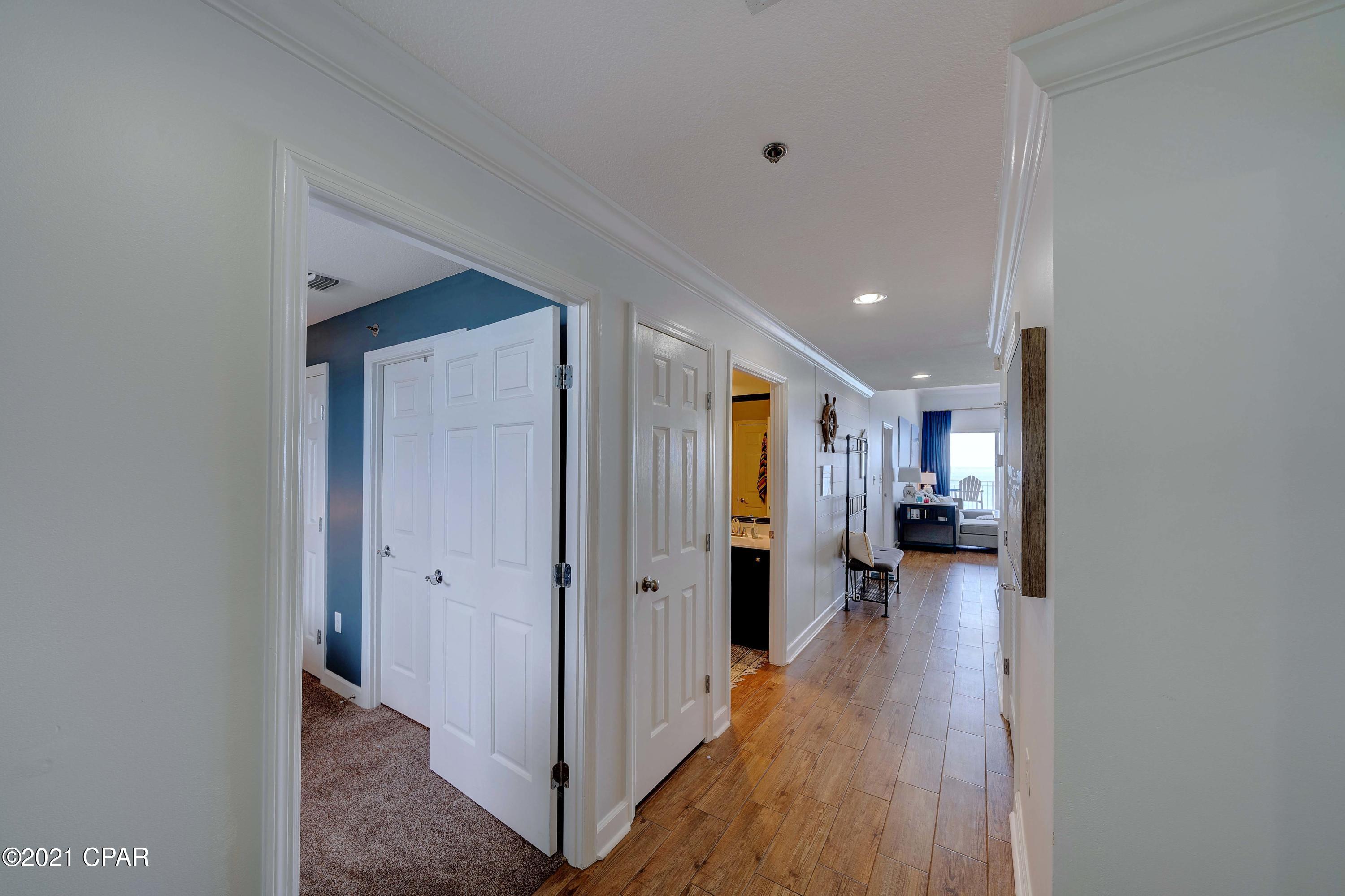 This Stunning unit offers 10ft ceilings in living room and master bedroom, a chefs kitchen with dishwasher, smooth top stove, stainless appliances, beautiful white solid surface granite countertops with raised breakfast bar and pantry with full size washer & dryer. Gorgeous porcelain plank tile throughout with carpeted bedrooms. Master bedroom has gulf front views and an adjoining bath featuring double sink vanities and a GORGEOUS freestanding white porcelain deep soaking tub.



 Sterling Beach Resort features a tropical lagoon shaped pool and spa surrounded by palm trees. The resort amenities include a large heated Lagoon Pool surrounded by a 8,800 square foot sun deck, a whirlpool spa, a 48 seat movie theater/presentation room, two natural gas barbecue grills, gulf font health & fitness center, two high speed elevators, on-site rental management office, security, gated entry, and on-site first floor parking.