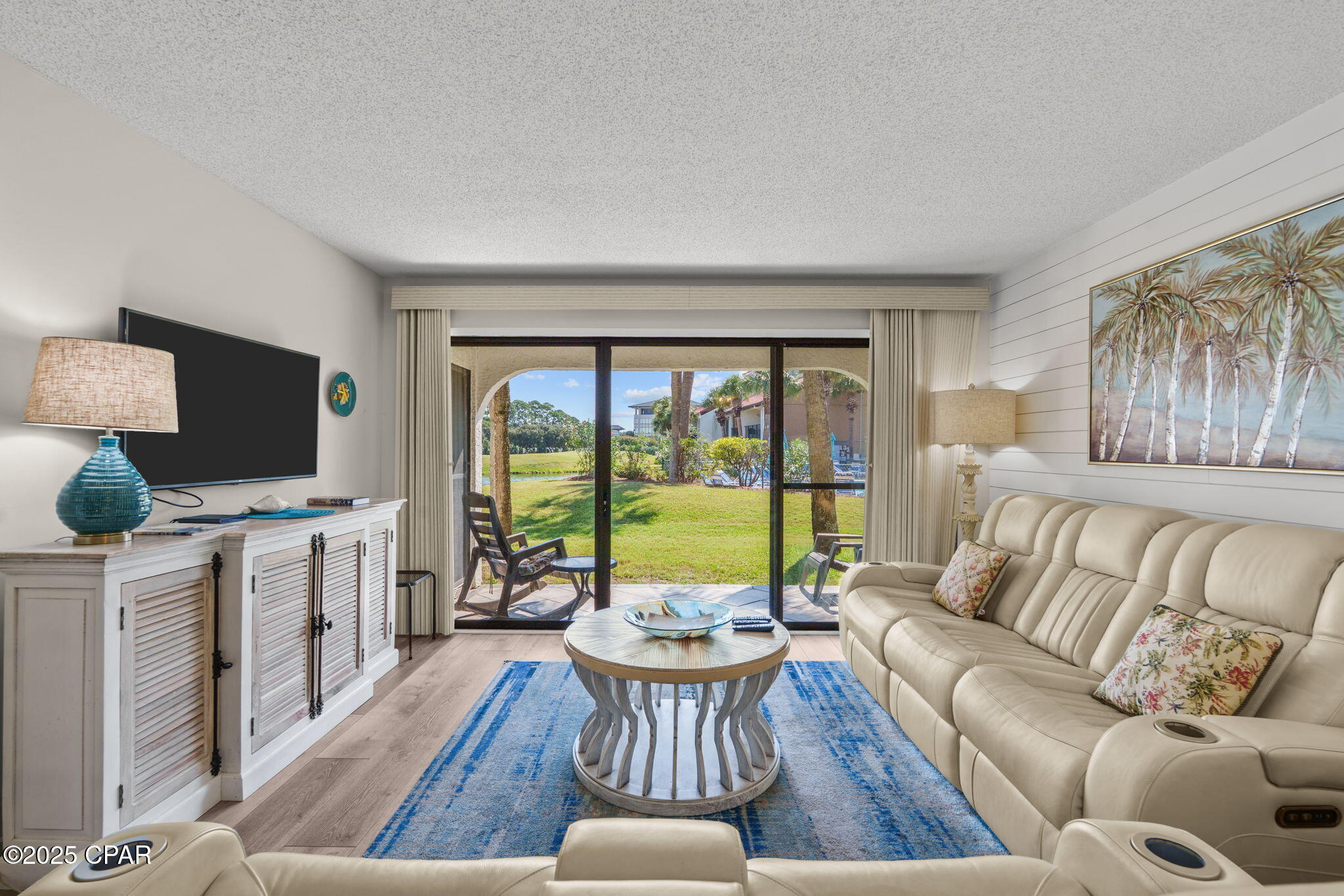Beautiful 2 bedroom/2 bathroom villa at Edgewater with pond and pool views!! This fully furnished unit showcases luxury vinyl plank flooring throughout, a spacious kitchen featuring a breakfast bar, full sized stainless steel appliances, washer/dryer, and pantry. The kitchen overlooks the living room and eat-in dining area. Living room features sliding glass doors to the back patio. Secondary bedroom features 2 full sized beds with a Jack-n-Jill style bathroom; tiled tub/shower combo and hallway access. Master bedroom and en-suite feature a large bedroom with floor length windows for great natural lighting; tiled shower and walk-in closet. Edgewater resort amenities include multiple pools, beach front pools, hot tubs, fitness center, golf, pickle ball, tennis, walkover bridge, 24hr security gate, beach access and more!  Call to schedule your private showing today! All Measurements approx. buyer to verify if important.