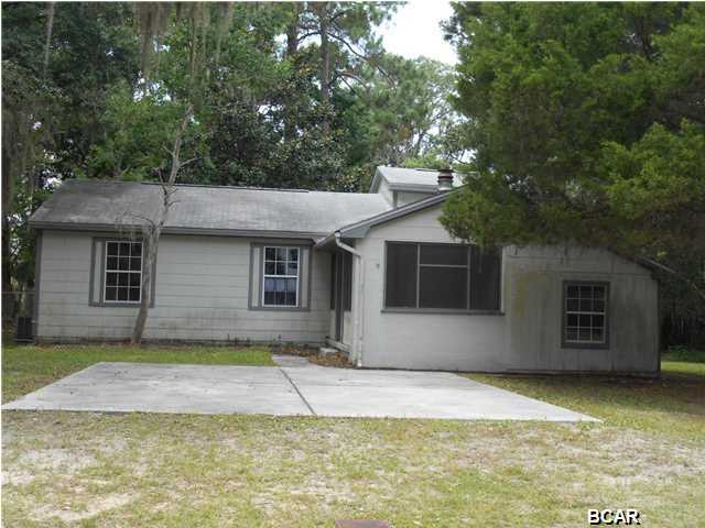 Big Price Reduction! Take another look, you won't find another in this area, at this price. Here's a great opportunity to own a large home, located in desirable Lynn Haven, at a super affordable price. In addition to 4 bedrooms and 2 baths, this home boasts 2 dens and a formal living/dining room area. Conveniently located, within walking distance to the Bay and just down the street from the boat landing, it would make a great buy for the boater who needs lots of room. There is a large back yard, and an alley behind the lot, for easy access and storage for all your ''toys.'' (Buyer to verify ANY info that is important. All info provided is approximate.)