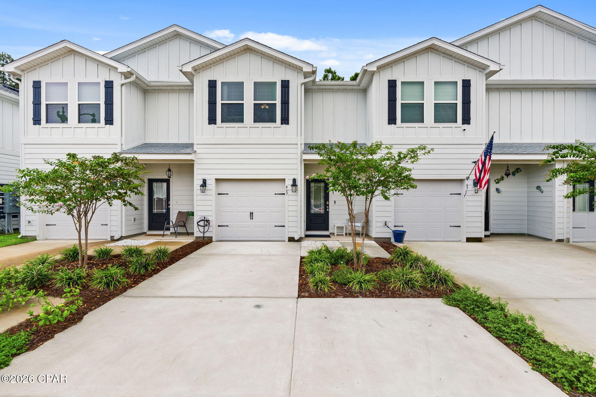 Welcome to 467 Melrose Way, a beautiful 3-bedroom, 2.5-bath townhome in Bayside at Ward Creek! Built in 2024, this move-in-ready home offers modern finishes and a functional two-story floor plan designed for comfortable Florida living. The main level features an open living and dining area, luxury vinyl plank flooring, and a stylish kitchen with quartz countertops, center island, stainless steel appliances, pantry, and plenty of cabinetry. Upstairs, you'll find all three bedrooms, including a spacious primary suite with walk-in closet, dual-sink vanity, and walk-in shower. Additional features include smart-home technology, a 1-car garage, and driveway parking. Enjoy community amenities including a pool, playground, sidewalks, BBQ/grilling and picnic areas, and pavilion/gazebo. Conveniently located near Pier Park, Frank Brown Park, Conservation Park, shopping, dining, entertainment, and the beautiful beaches of Panama City Beach.
