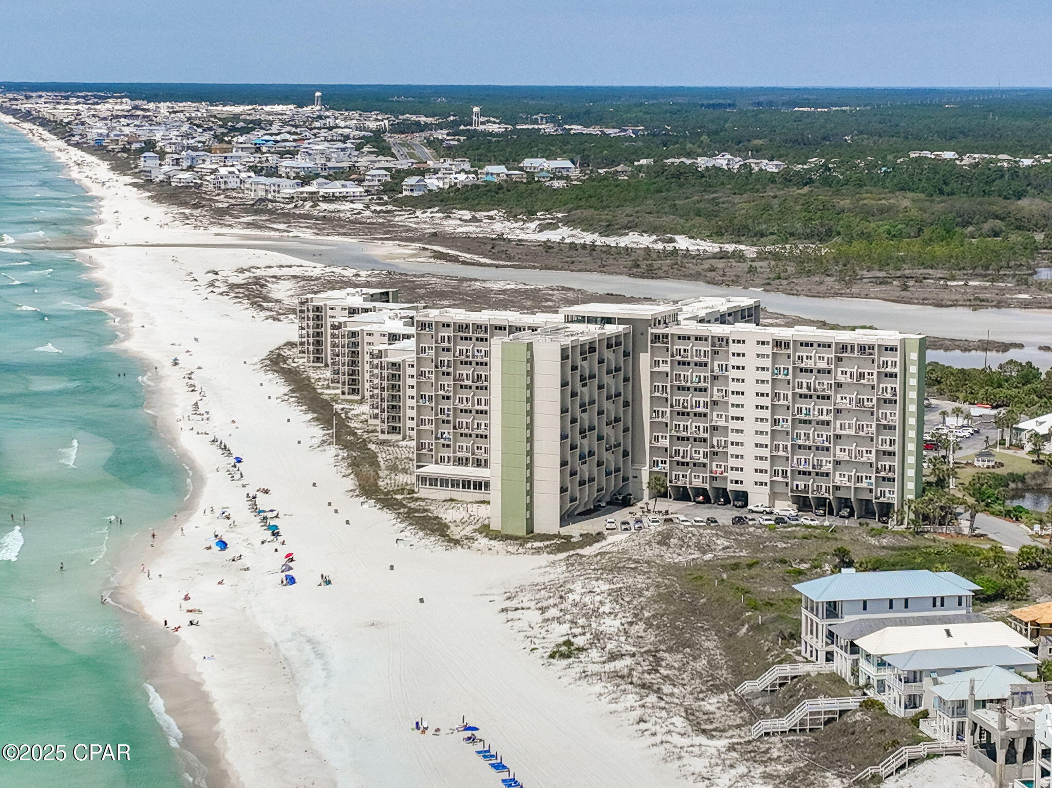Purchase for only 10% down!  Gulf front living w/ the LAKEFRONT lifestyle at your fingertips...The wait is OVER! Step into coastal elegance at Pinnacle Port A-305, a gulf-front condo offering breathtaking water views and an oversized private balcony overlooking the emerald waters and sugar-white sands of Panama City Beach. Inside, the Master Suite features a queen bed, ensuite bath, and direct balcony access with stunning water views. The guest bedroom offers two twin beds, comfortably accommodating up to 4+ guests.

The well-appointed kitchen showcases sleek countertops and everything you need to prepare meals, from your morning coffee to sunset dinners, all while enjoying the beauty of the Gulf. Designed for comfort and relaxation, this condo blends functionality with style, making it an incredible value for true gulf-front living.

Pinnacle Port is a gated beachfront community tucked between Camp Helen State Park and Carillon Beach, with rare Lake Powell just to the north. Resort-style amenities include two large swimming pools, fitness center, saunas, tennis and pickleball courts, bocce ball, shuffleboard, playground, picnic pavilions, and a boat dock with direct lake access. Kayaks and paddleboards can also be rented nearby for endless outdoor adventures.

Located on the quiet west end of Panama City Beach, Pinnacle Port provides the perfect balance—just minutes to 30A's scenic corridor and Pier Park's shopping, dining, and entertainment, yet offering the privacy and tranquility of a secluded gulf-front community.

Unit A-305 delivers luxury, lifestyle, and an unbeatable price point for gulf-front living in Panama City Beach—ideal as a personal getaway or investment property.

Well qualified buyers can purchase for only 10% down!
