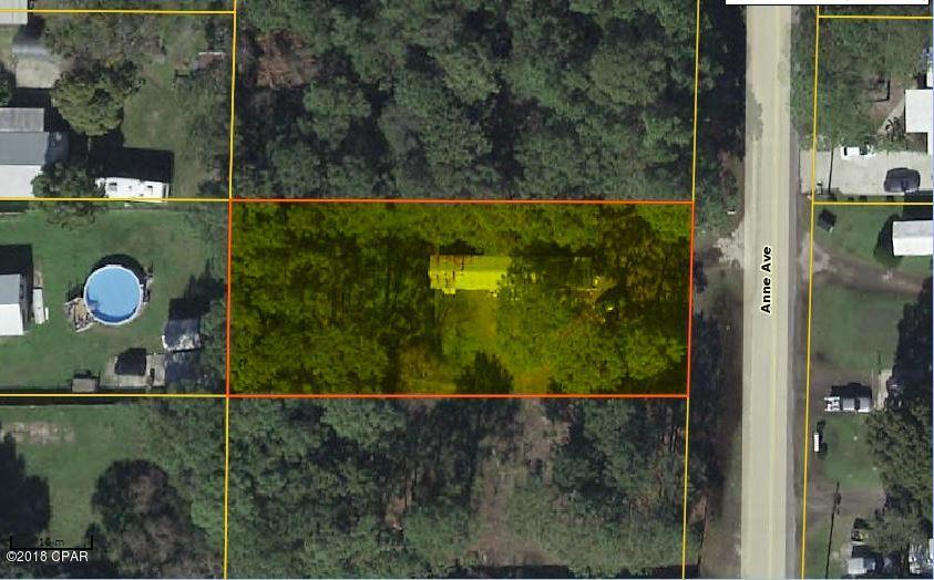 Very large Beach lot with R-2 zoning that allows for new construction. Close to everything. Just minutes from Panama City and blocks away from the most Beautiful Beaches. Mobile home not being conveyed with Sale it has no value. it is currently Tenant Occupied. Do not disturb tenant.  The Value is in the land. Mobile and land being sold 'As-Is' Mobile to be removed prior to any closing date set.