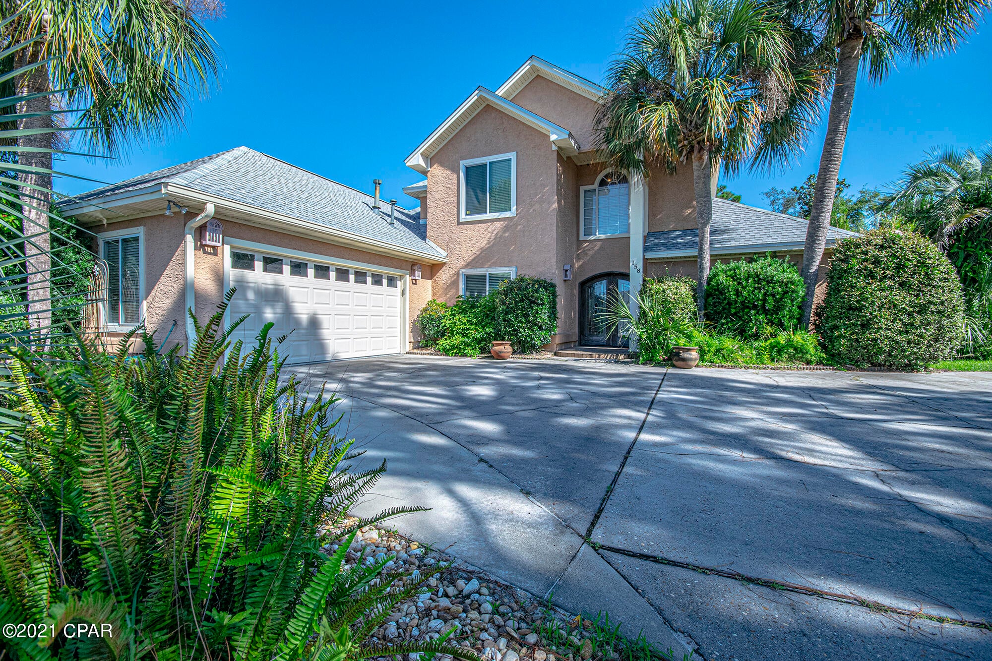 'CURRENTLY UNDER CONTRACT, SELLER ACCEPTING BACKUP OFFERS' Come and See this lovely 4 bedroom, 3 bath home in prestigious Bay Point.  Master Bedroom on the Main Floor with Luxury Master bath that includes a Spa Jacuzzi Shower you will love to relax in.  Bedroom 2 is also on the main floor and can be used as a mother in law suite.  Open and Spacious Family Room, Dining Room, Kitchen and Breakfast Room great for entertaining.  The Florida Room is heated and cooled with a bar area that includes ice machine and refrigerator.  The Florida room overlooks the pool are and fenced yard.  Two spacious bedrooms on upper level with jack-n-jill bath.  Home has newer carpet, gas stove, finished Florida room with ice maker and bar area, newer windows (except in master) and doors, newer roof,  master spa/