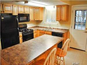 GULF HIGHLANDS IS A COMPLETE RESORT WITH EVERYTHING YOU COULD WANT * THIS UNIT HAS COMPLETELY BEEN REDONE * NEW KITCHEN CABINETS, NEW APPLIANCES, NEW BATHROOM VANITY, NEW WASHER, NEW DRYER, NEW CARPETING, NEW REAR DOOR * DON'T MISS THIS OPPORTUNITY OPEN FLOOR PLAN - THE RESORT FEATURES 11 POOLS (5 HEATED), TENNIS COURTS, MINI GOLF, SHUFFLEBO9ARD, BEACH SIDE CLUB HOUSE WITH POOL * INCREDIBLY AFFORDABLE FOR VACATION HOME OR GREAT INVESTMENT ***** CAN USE RURAL DEVELOPMENT LOAN *****