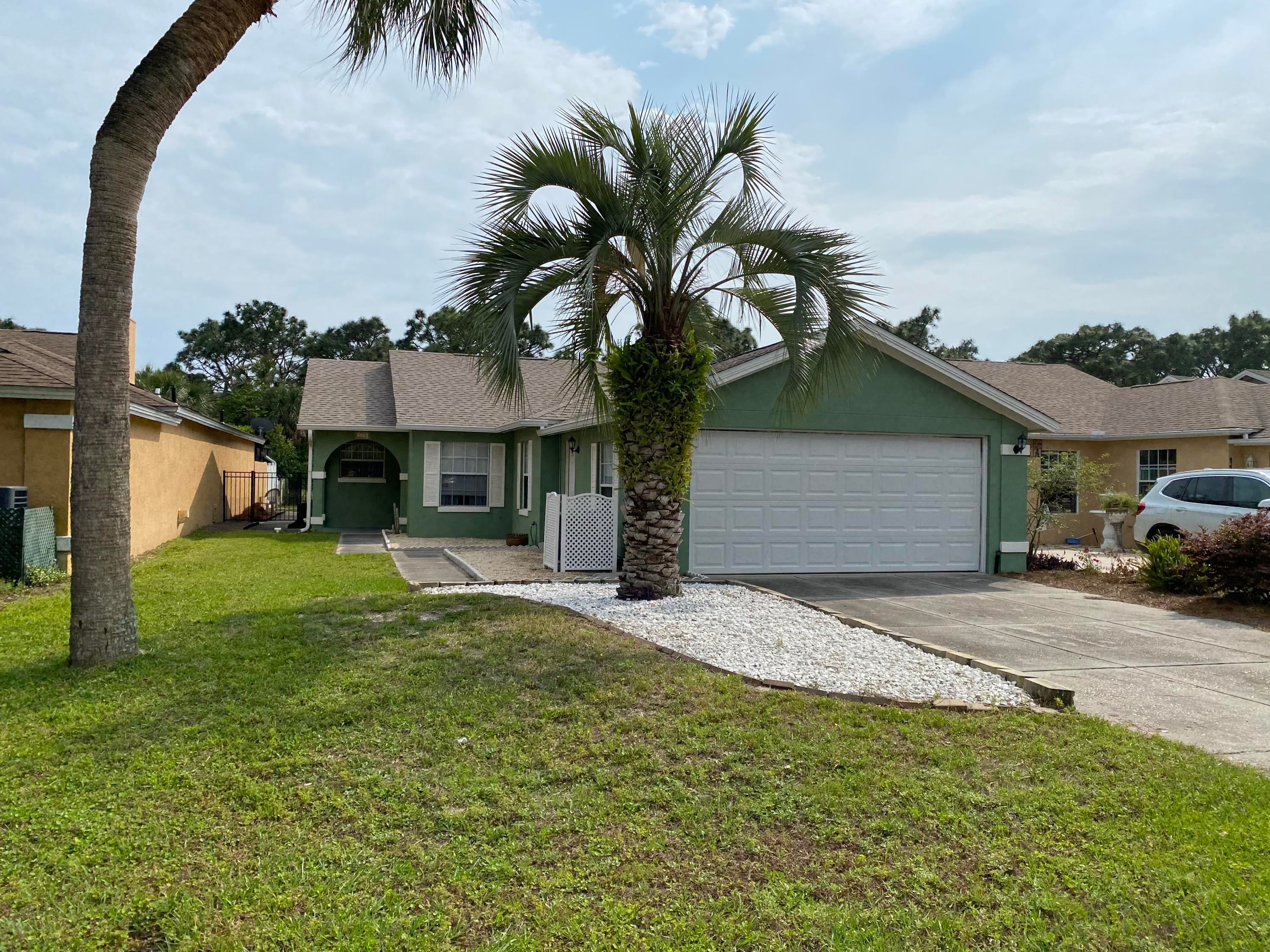 CURRENTLY UNDER CONTRACT, SELLER ACCEPTING BACKUP OFFERS - Nice home located in the Glades neighborhood which is minutes from the beach and is golf cart friendly with access on Hutchison Blvd and PCB PKWY. Home offers 3 bedrooms, 2 bathrooms and a screened in pool. There are many recent updates throughout the home including new roof, skylights, ceiling fans and fence in 2016.  New appliances, granite countertops, resurfaced cabinets, garage door and opener and exterior painted in 2017.  New A/C system and pool resurfaced in 2018. The layout of this home is very open and airy. Walk or Golf Cart to multiple restaurants, shopping and the beach. Come see today!
