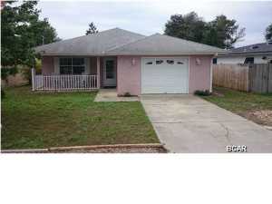 VERY NICE 3 BED 2 BATH HOME LOCATED ON THE DESIRABLE WEST END OF THE BEACHES, AND IS CONVENIENTLY LOCATED IN BETWEEN PIER PARK AND 30A. THIS HOME OFFERS A VERY OPEN FLOOR PLAN WITH CERAMIC TILE THROUGHOUT THE ENTIRE HOUSE. HOME OFFERS A ONE CAR GARAGE WITH A LARGE LAUNDRY ROOM CONNECTING THE GARAGE AND THE REST OF THE HOME. YOU WILL ALSO BE ABLE TO SIT OUTSIDE IN THE LARGE SCREENED IN PORCH TO ENJOY ALL THE NIGHT TIME BREEZES. THE HOME IS A PLEASURE TO SHOW WITH GREAT INTERIOR COLORS AND CLEAN AS A WHISTLE. THIS HOME WITH ITS STUCCO EXTERIOR AND VINYL TRIM IS PRATICALLY MAINTENANCE FREE.