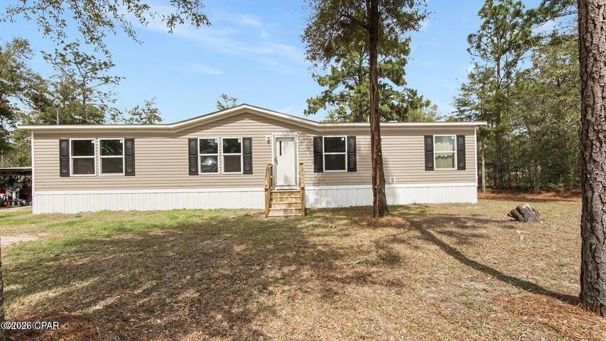 ription: LOT 1 BLK 49 OAKWOOD HILLS UNIT 3 PB 4-2 OR 90-63 OR 2434-1556 OR 24351374 OR 2639-1544 OR 2805-1212 OR 3084-2803
Remarks: Welcome to 188 Pinetree Lane in DeFuniak Springs! This inviting 4-bedroom, 2-bath home offers the perfect blend of comfort and country charm. Step inside to a bright, open-concept layout designed for easy everyday living and relaxed gatherings. Durable vinyl plank flooring runs throughout the entire home, providing a warm look with easy maintenance. The kitchen truly serves as the heart of the home, featuring a center island that's perfect for meal prep, casual dining, or enjoying your morning coffee. The four bedrooms offer comfortable, functional space with flexibility for family, guests, or a home office. With peaceful surroundings and room to breathe, this home delivers the simplicity and charm of country living while still being convenient to nearby amenities. If you're looking for a place that feels welcoming from the moment you walk in, this one is a must-see. Schedule your private showing today!