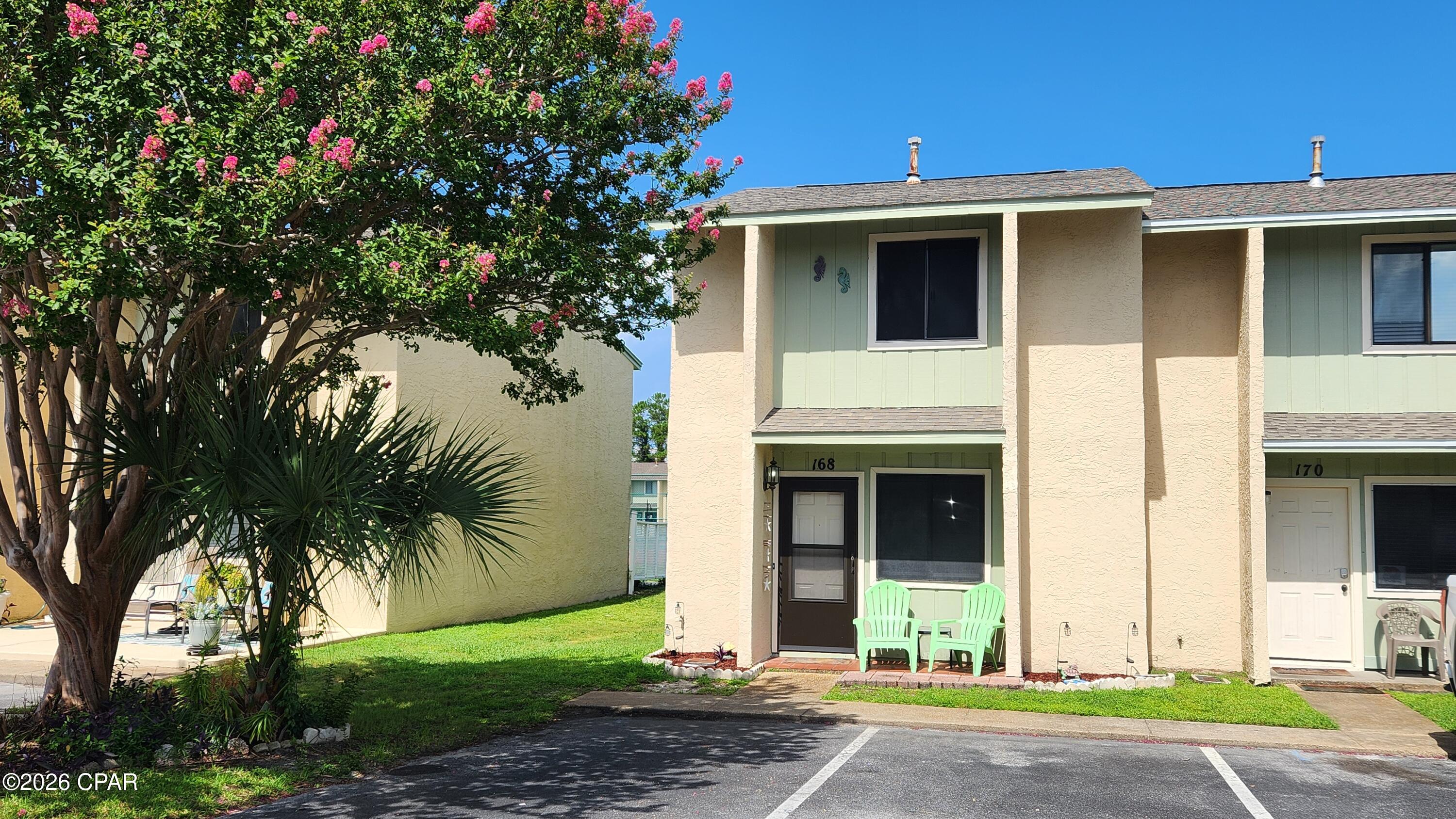 LOCATION is the best part of this townhome in Gulf Highlands Beach Resort- backing up to an open recreation area and just down the sidewalk from The World's Most Beautiful Beaches. Corner unit allows extra room for golf cart parking. This unit comes fully furnished and has a rental history that ensures abundant income to help offset your cost of ownership. Gulf Highlands offers all the amenities necessary to have a complete vacation experience without leaving the resort including 11 pools, a beachside clubhouse with a restaurant and a pool right on the sand, pickleball, tennis, mini-golf, shuffleboard, playgrounds, workout room, and so much more! Come take a tour today or call your favorite real estate agent for additional information.