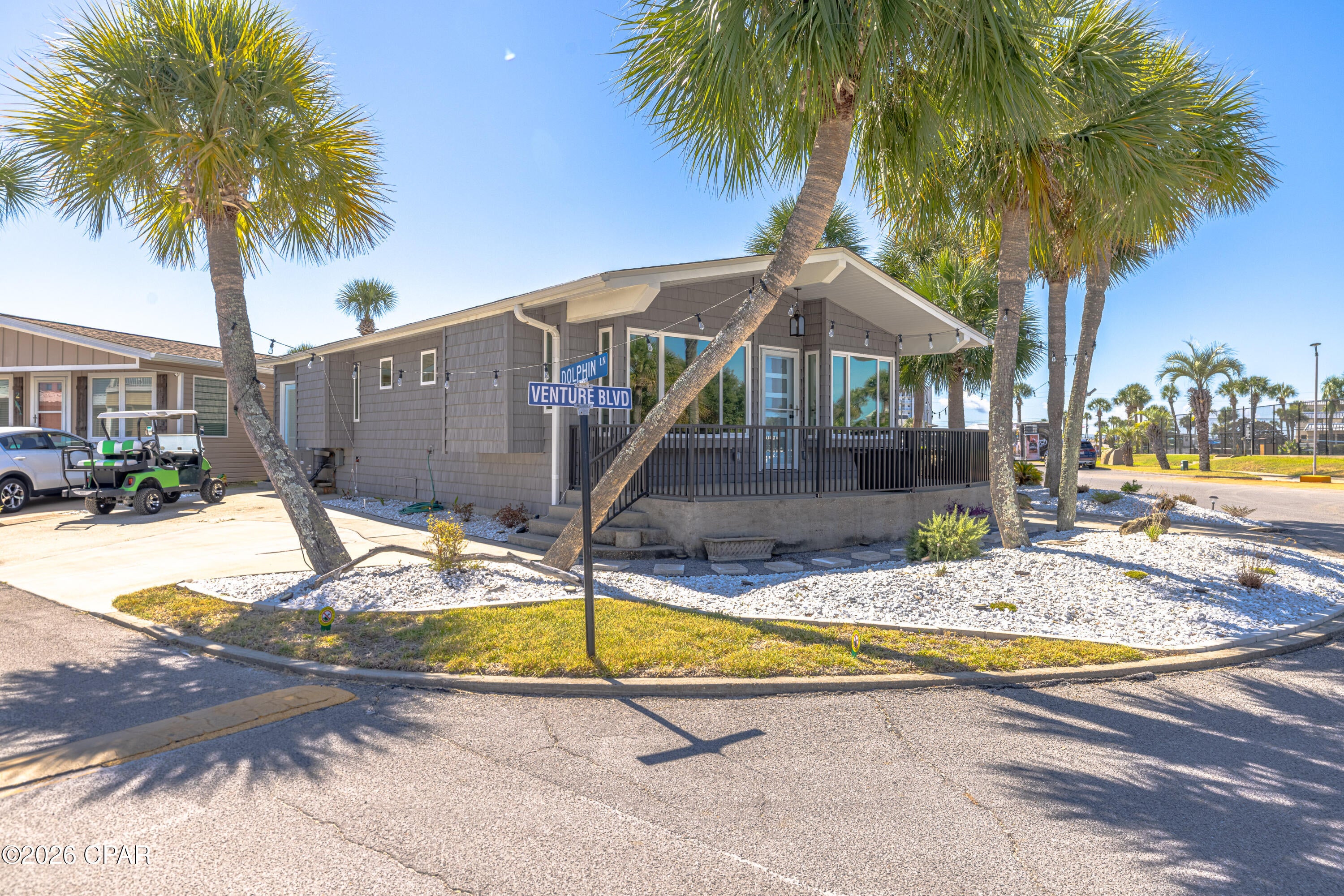 RARE !
3 BEDROOM + 2.5 BATH OPPORTUNITY IN VENTURE OUT! 
FULLY FURNISHED turnkey and Recently Converted from a 2/2.
ready for you to start enjoying the Panama City Beach lifestyle from day one!

Welcome to 001 Dolphin Lane, located in one of Panama City Beach's most sought-after gated beach communities. This beautifully updated home offers THREE bedrooms and TWO AND A HALF baths, providing plenty of space for family, friends and beach guests. The home is being sold FULLY FURNISHED, making this an easy, turnkey opportunity--just bring your flip-flops and start enjoying life at the beach!

But the home is only part of what makes this property special--VENTURE OUT IS ALL ABOUT THE LIFESTYLE! Situated between the Gulf of Mexico and Grand Lagoon and adjacent to St. Andrews State Park, this incredible 100-acre community offers approximately 300 feet of PRIVATE BEACH, TWO SWIMMING POOLS including a beachside pool and a lagoon-side pool that is heated seasonally, PRIVATE BEACH ACCESS, fishing pier, private boat launch, boat slips, tennis and pickleball courts, basketball courts, shuffleboard, miniature golf, playground, picnic and BBQ areas, community clubhouse, snack bar, mini market, beach service and more!

Spend the morning on the beach, take the boat out from the community boat launch, fish from the pier, relax by one of the pools, play a round of miniature golf or pickleball, then cruise back home and enjoy the laid-back coastal lifestyle Venture Out is known for.

The community also offers a gated entrance with security, making Venture Out an incredible destination for full-time living, a second home or a beach getaway.

THREE BEDROOMS. 2.5 BATHS. FULLY FURNISHED. PRIVATE BEACH. BOATING. TWO POOLS. INCREDIBLE AMENITIES. ONE AMAZING PCB LOCATION!

Don't just buy a beach house--BUY THE VENTURE OUT LIFESTYLE! Schedule your private showing of 001 Dolphin Lane today.
