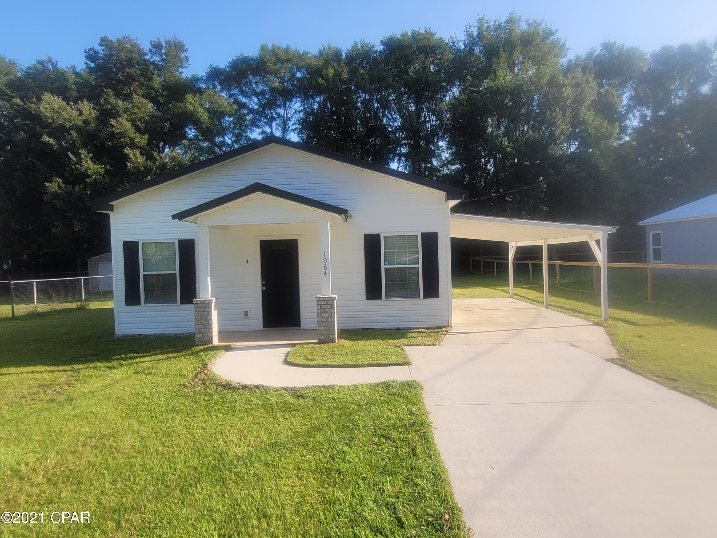 CURRENTLY UNDER CONTRACT, SELLER ACCEPTING BACKUP OFFERS. Charming 3/2 steel frame home built in 2017 is ready to go and waiting for its new family.  This home features a open kitchen with plenty of storage, new stainless refrigerator and microwave. The stainless stove can be operated with your phone, a breakfast bar for additional seating or quick meals. Master bedroom has master bathroom. 2 additional bedrooms and full bathroom. The home has been recently updated throughout with fresh paint, new blinds, Mohawk vinyl plank flooring, tile in bathrooms and laundry room. Electric tankless water heater. Covered front porch. Attached single car carport. Nice, easy to maintain lot. Close to grocery store, post office, and other amenities.